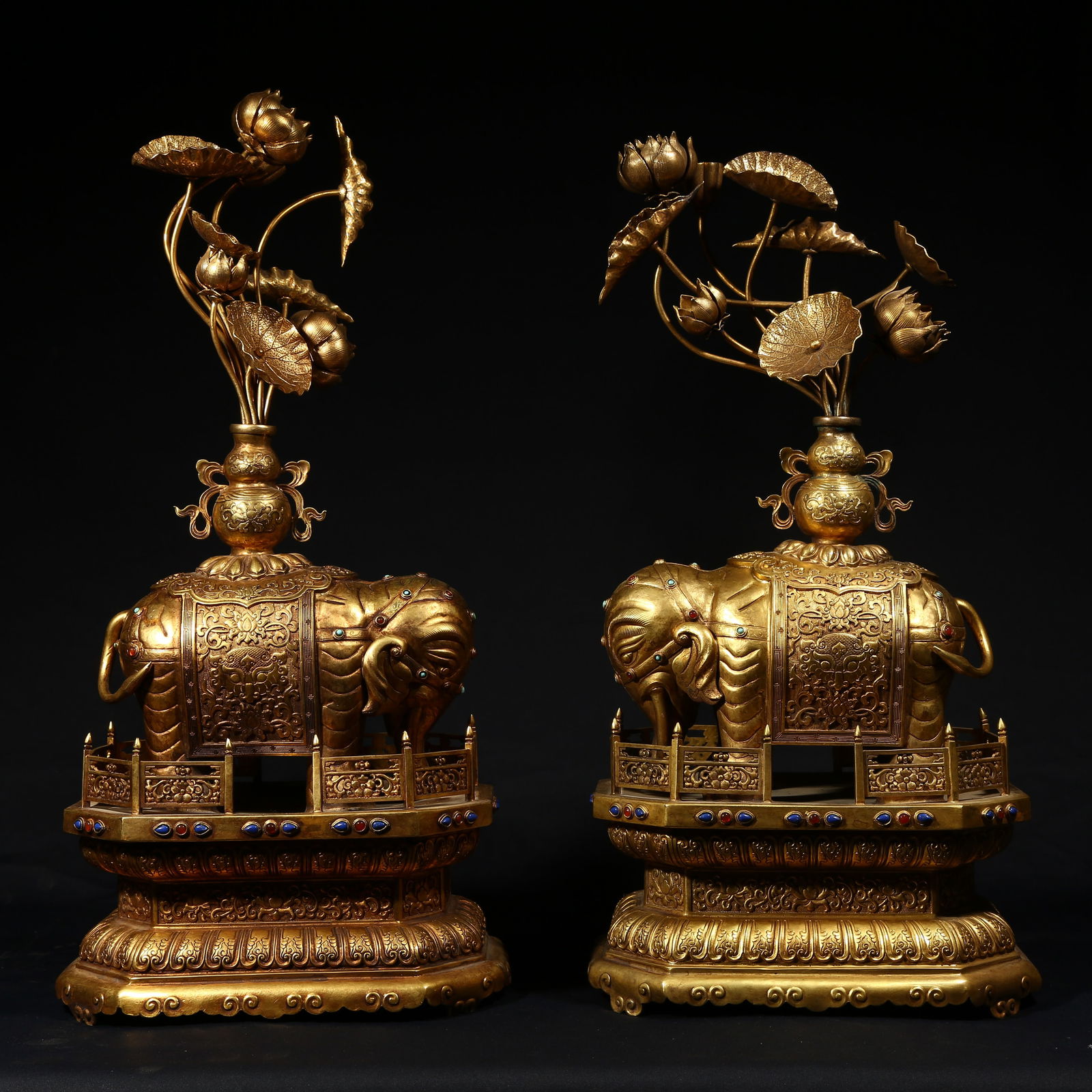 A GILDED BRONZE SET TITLED PEACE AND PROSPERITY WITH THE ELEPHANT (1 of 10)
