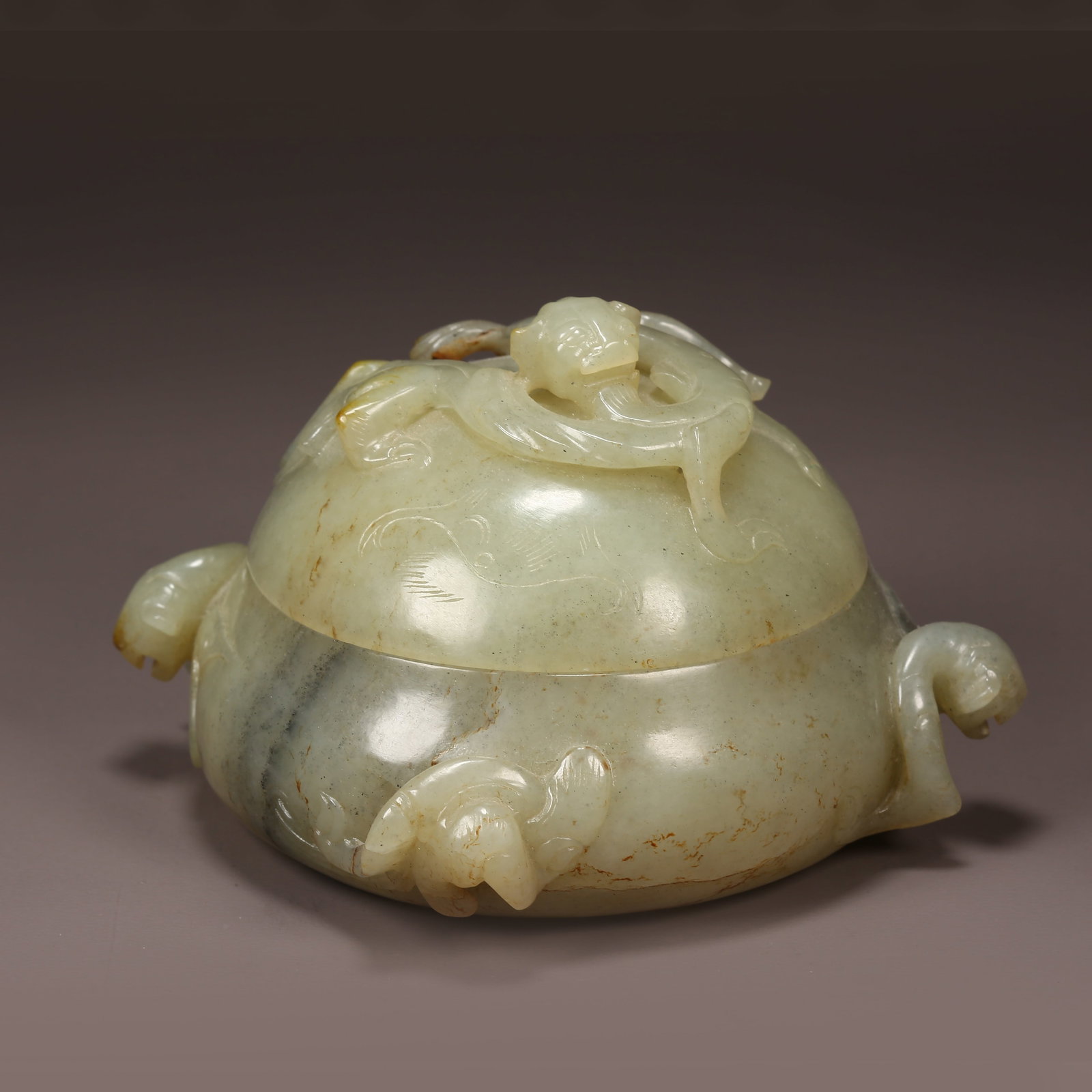A ANCIENT JADE COVERED JAR WITH CHI-DRAGON PATTERN (1 of 10)