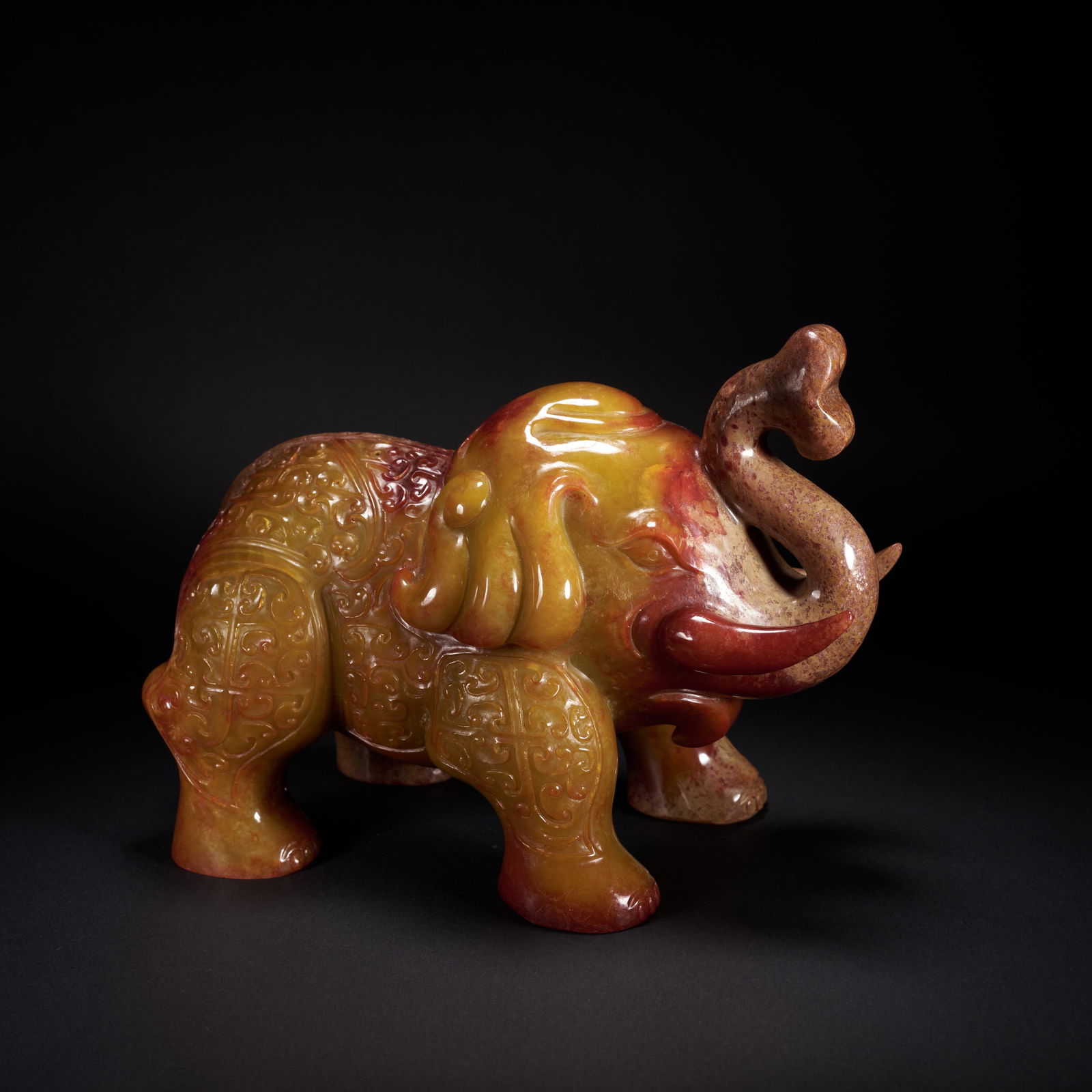 A HETIAN JADE "PEACE BRINGS ELEPHANTS" AUSPICIOUS ORNAMENT, HAN DYNASTY (1 of 8)