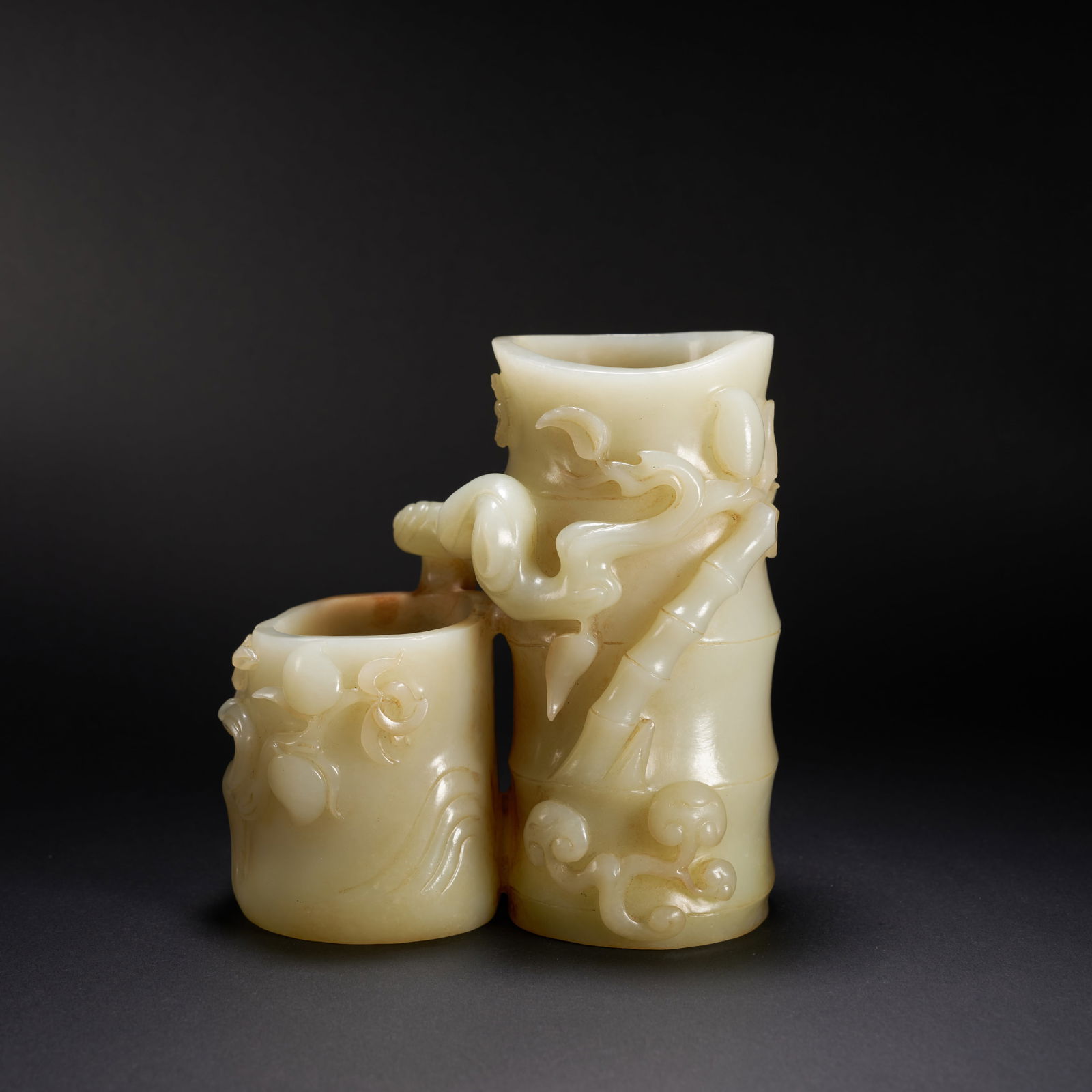 A HETIAN JADE DOUBLE PEACH OF LONGEVITY BRUSH HOLDER, MING DYNASTY: Hetian Jade Double Peach of Longevity Brush Holder, Ming Dynasty