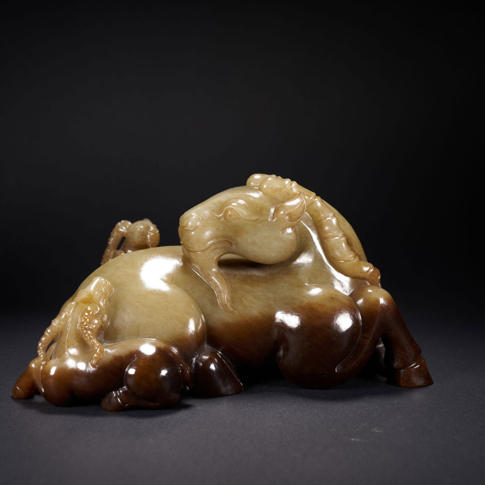 A HETIAN JADE "THREE RAMS BRING AUSPICIOUSNESS" ORNAMENT, HAN DYNASTY (1 of 9)