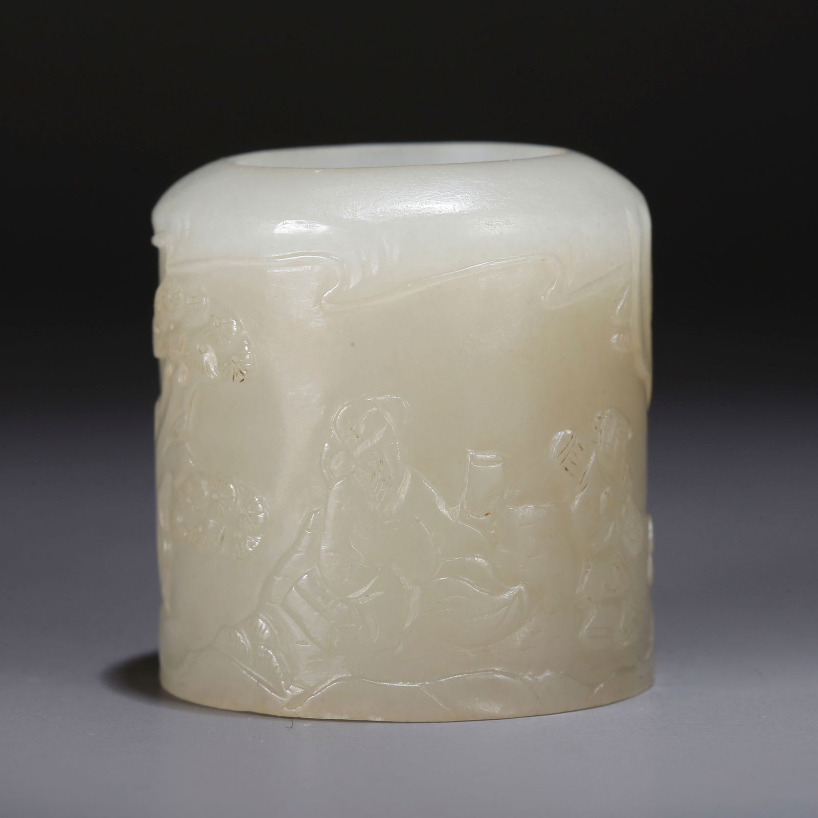 A HETIAN JADE THUMB RING CARVED WITH FIGURATIVE STORY PATTERN (1 of 9)