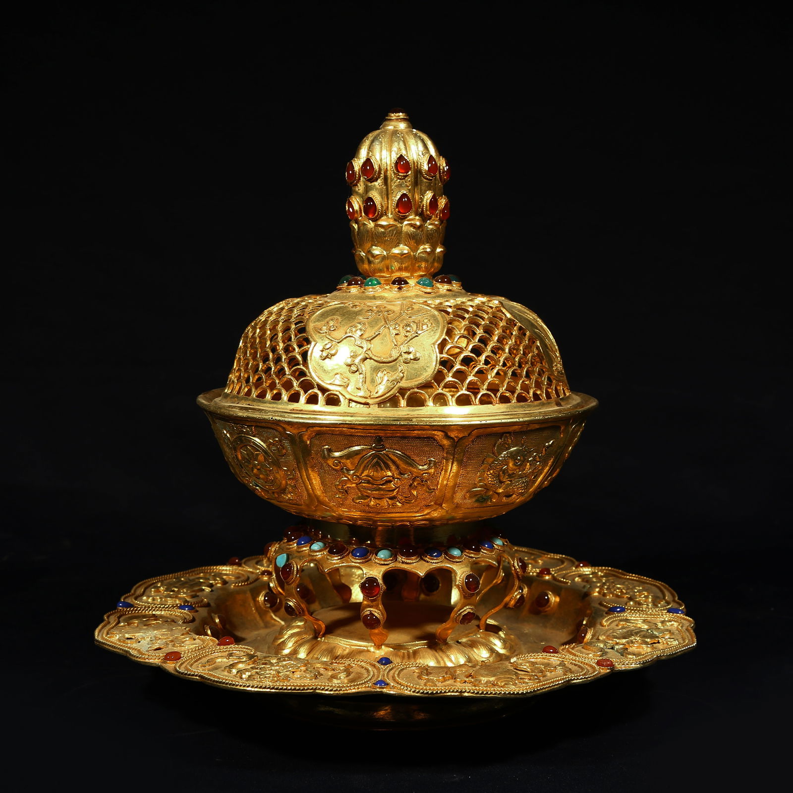 A GILDED BRONZE OFFERING BOWL WITH EIGHT AUSPICIOUS SYMBOLS (1 of 10)