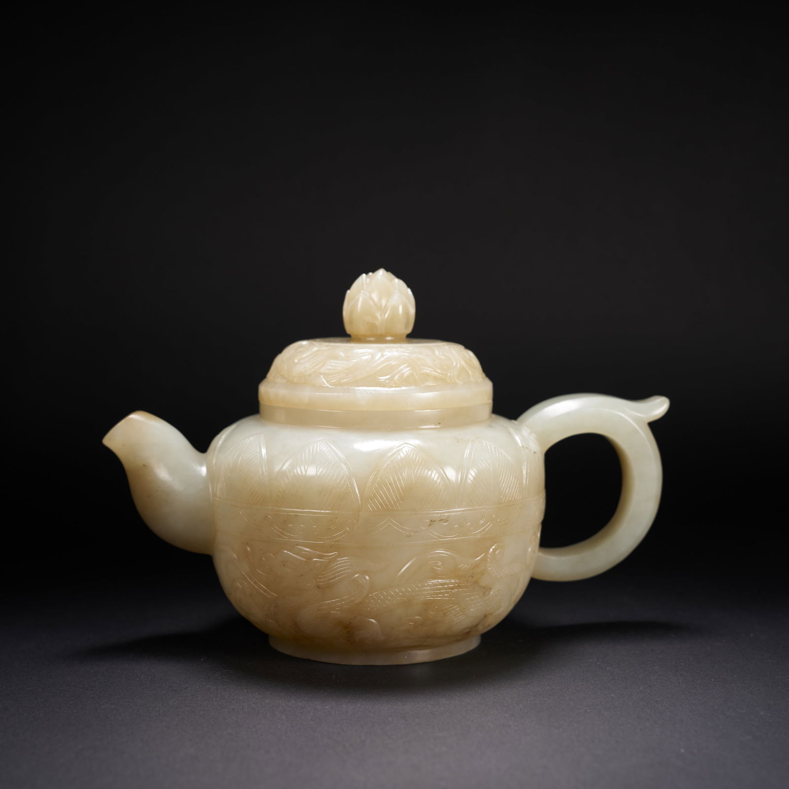 A HETIAN JADE WINE EWER WITH DRAGON MOTIF AND LOTUS-SHAPED COVER, LIAO DYNASTY (1 of 9)