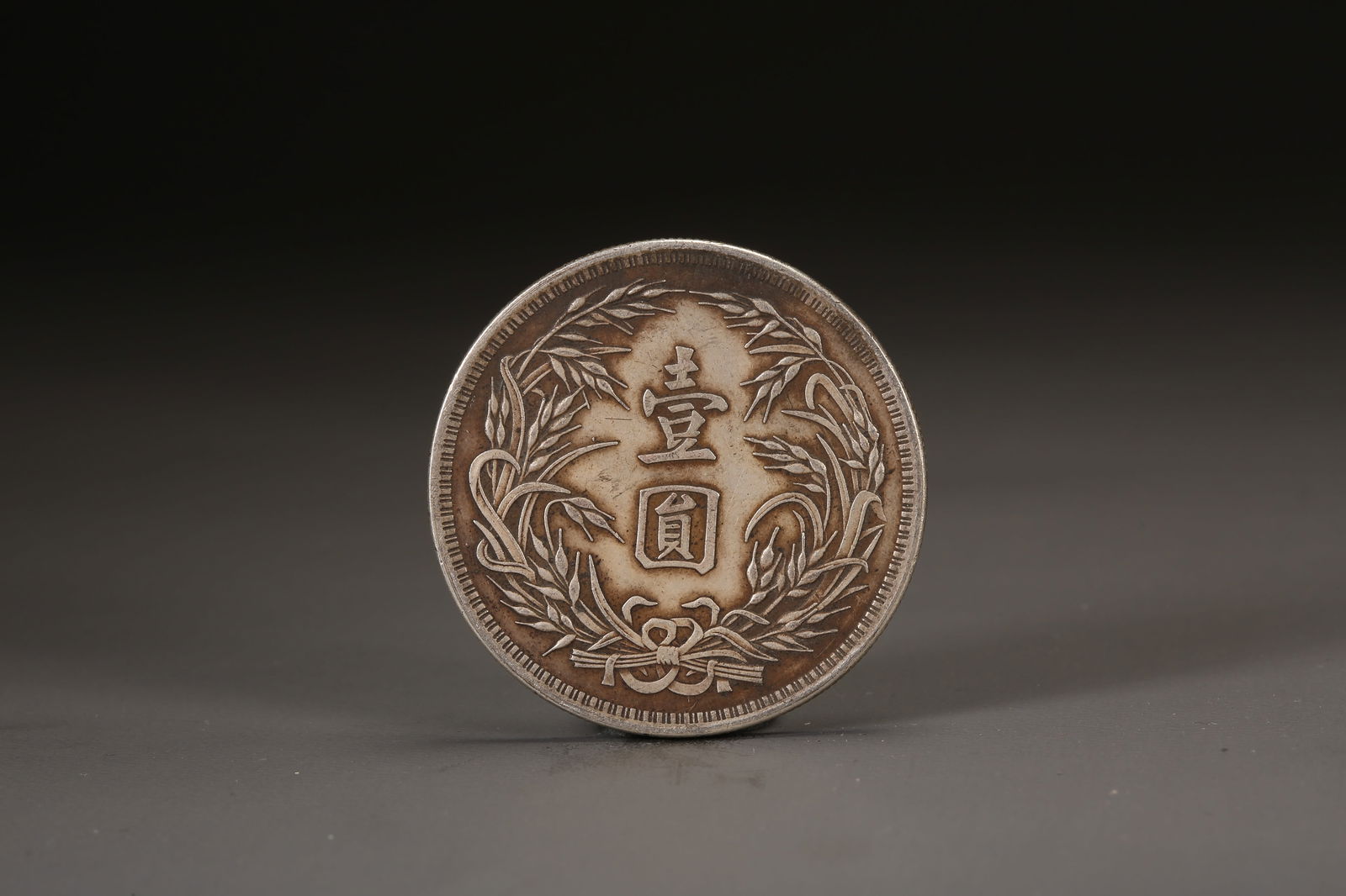 A SILVER DOLLAR COIN - 3