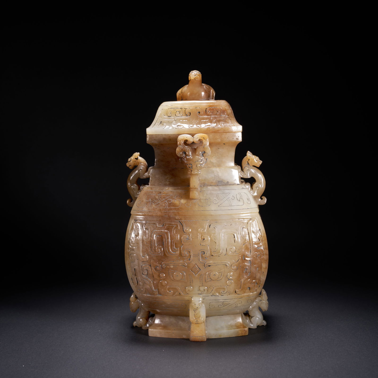A HETIAN JADE COVERED VASE WITH FOUR DRAGON EARS AND BEAST-MASK MOTIFS, HAN DYNASTY (1 of 8)