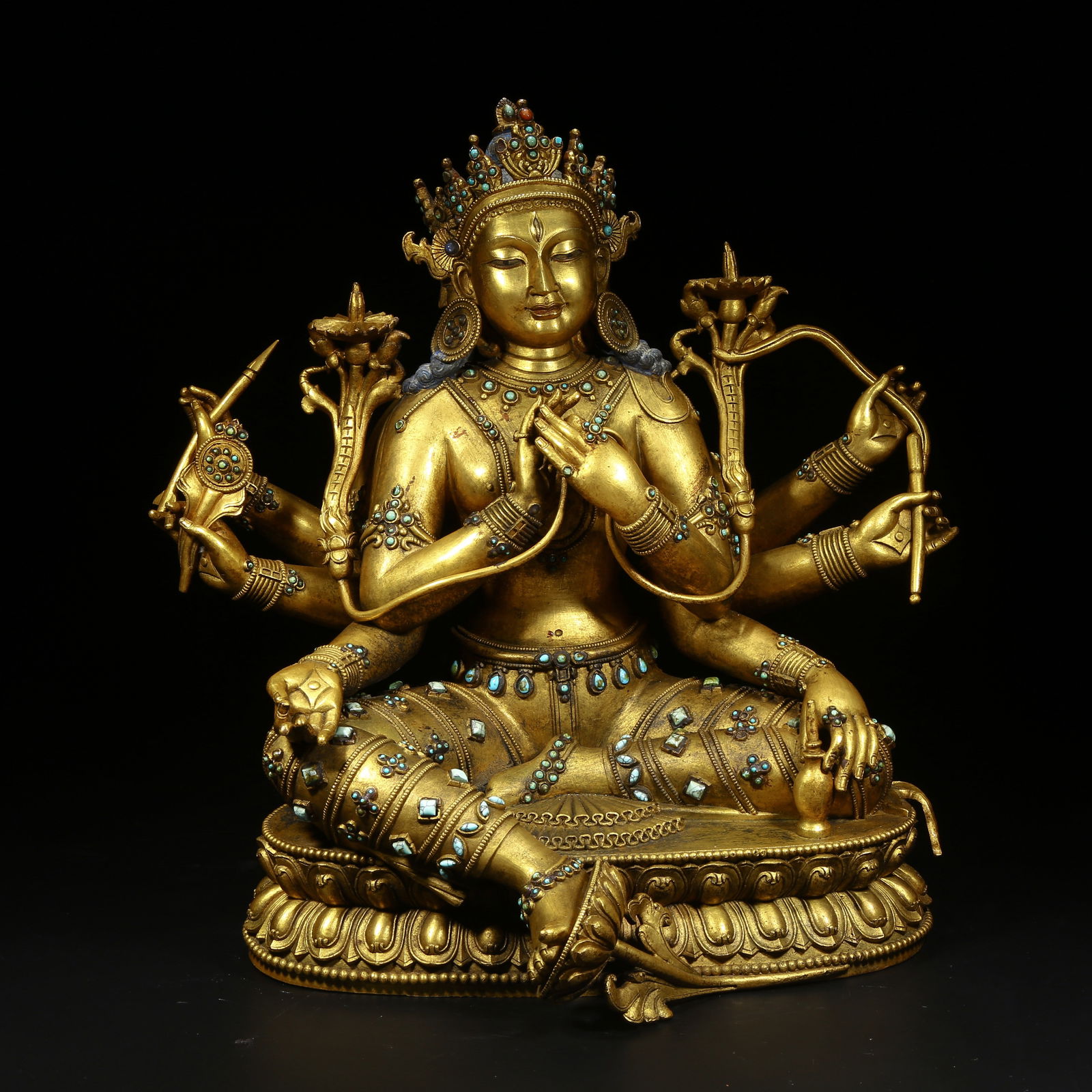 A GILDED BRONZE STATUE OF VAJRAVARAHI INLAID WITH TURQUOISE (1 of 8)