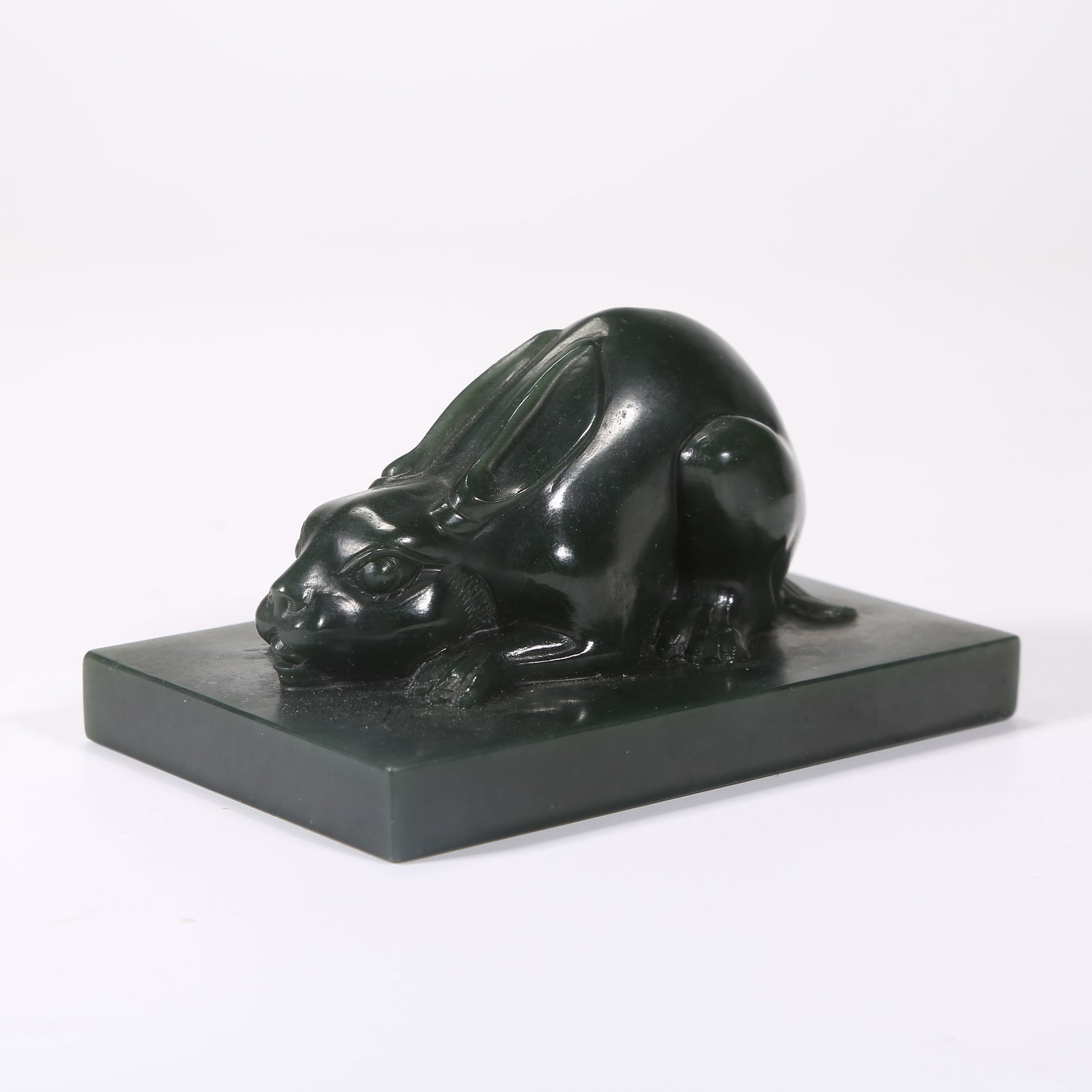 A HETIAN GREEN JADE RABBIT FINIAL PAPERWEIGHT (1 of 9)