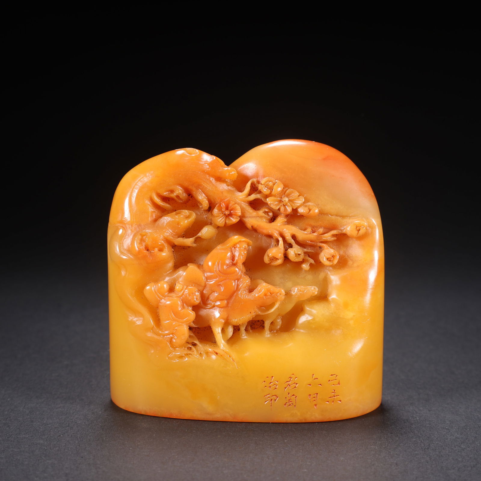 A TIANHUANG STONE SEAL WITH PLUM BLOSSOM AND FIGURE MOTIF: Tianhuang Stone Seal with Plum Blossom and Figure Motif