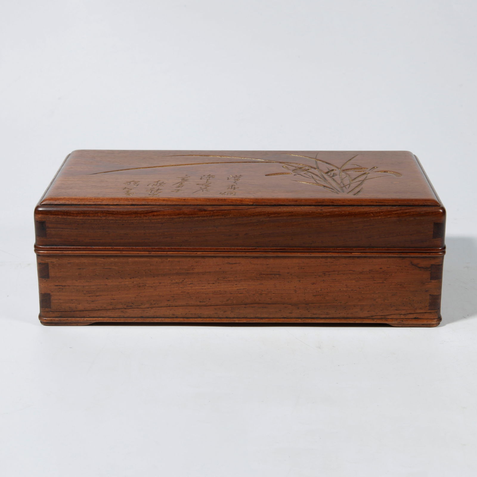 A HUANGHUALI WOOD BOX WITH FLOWER AND PLANT CARVING (1 of 9)