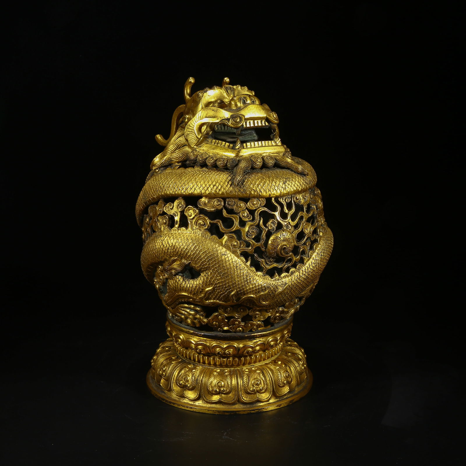 A GILDED BRONZE INCENSE BURNER WITH CLOUD AND DRAGON PATTERN (1 of 9)