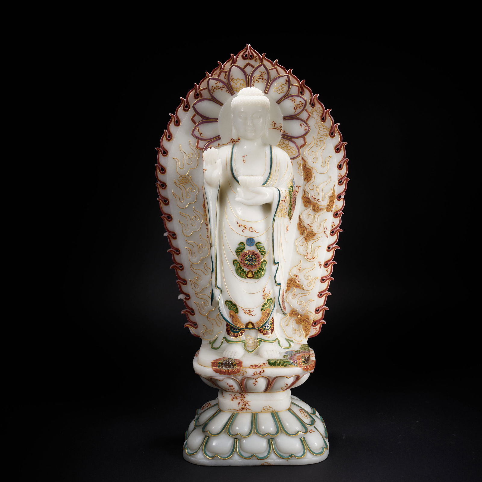 A PAINTED HETIAN JADE STANDING SHAKYAMUNI BUDDHA, TANG DYNASTY (1 of 9)