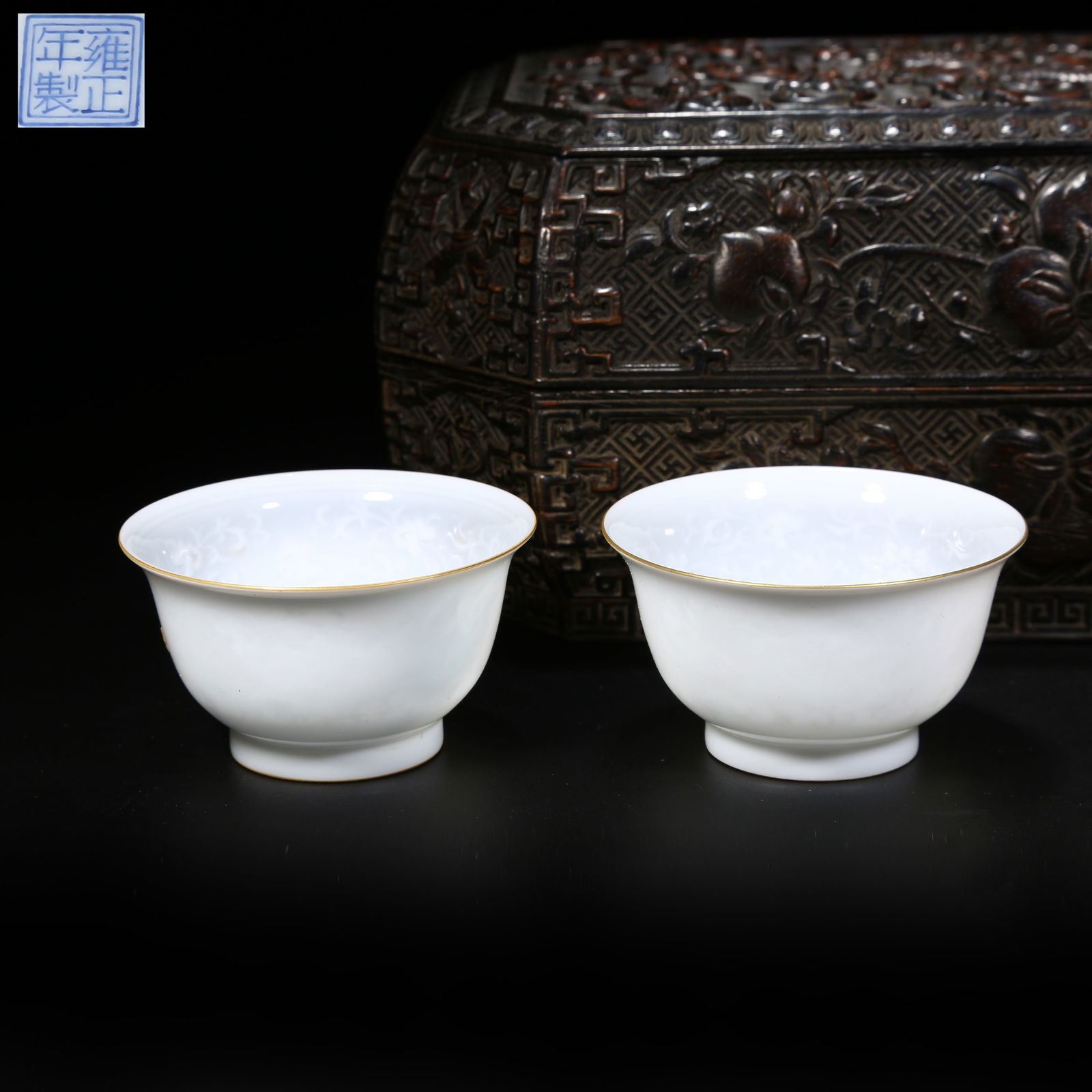 A SET OF WHITE GLAZE CUPS WITH INCISED PASSIONFLOWER PATTERN: A set of white glaze cups with incised passionflower pattern