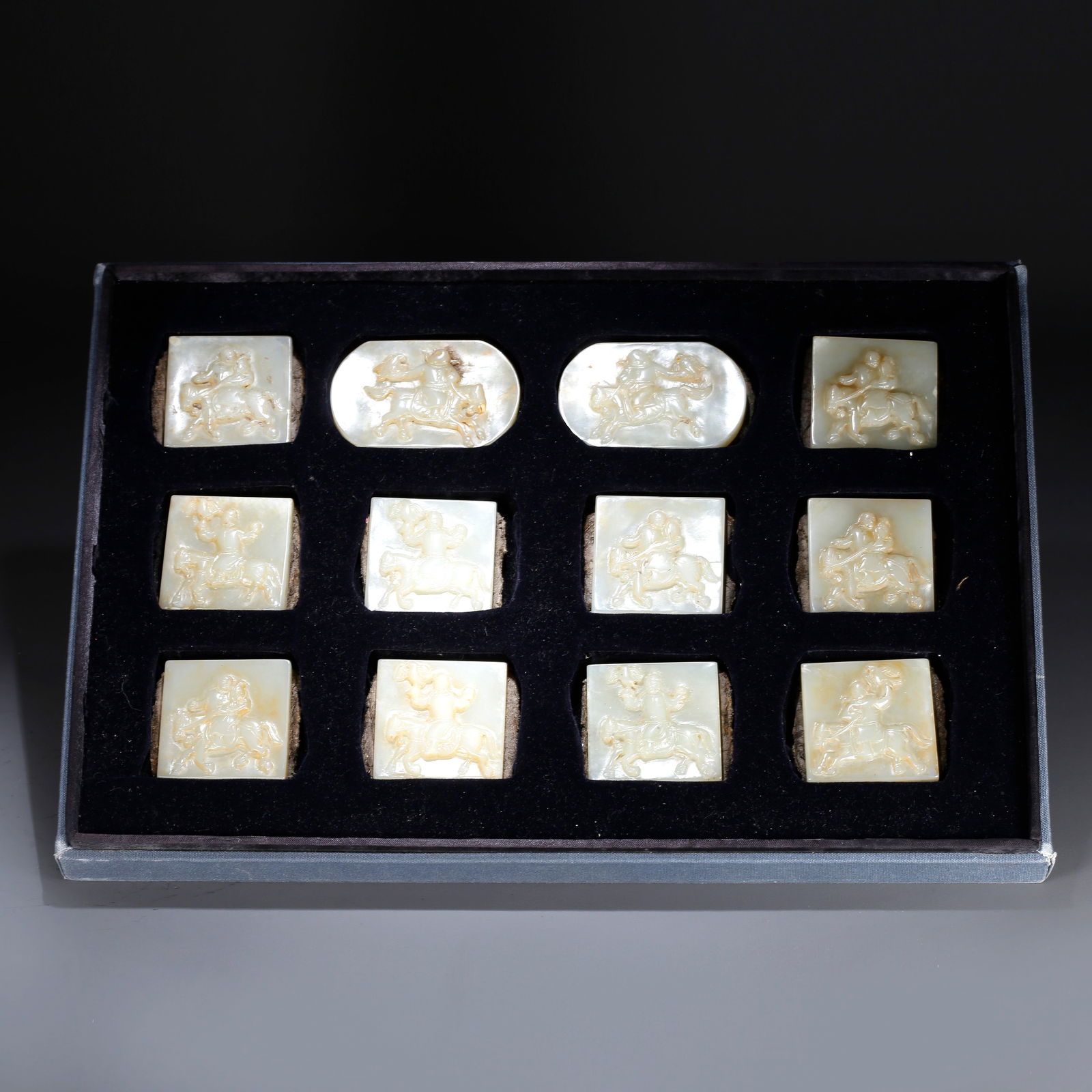 A SET OF HETIAN JADE BELT BUCKLES: Set of Hetian jade belt buckles