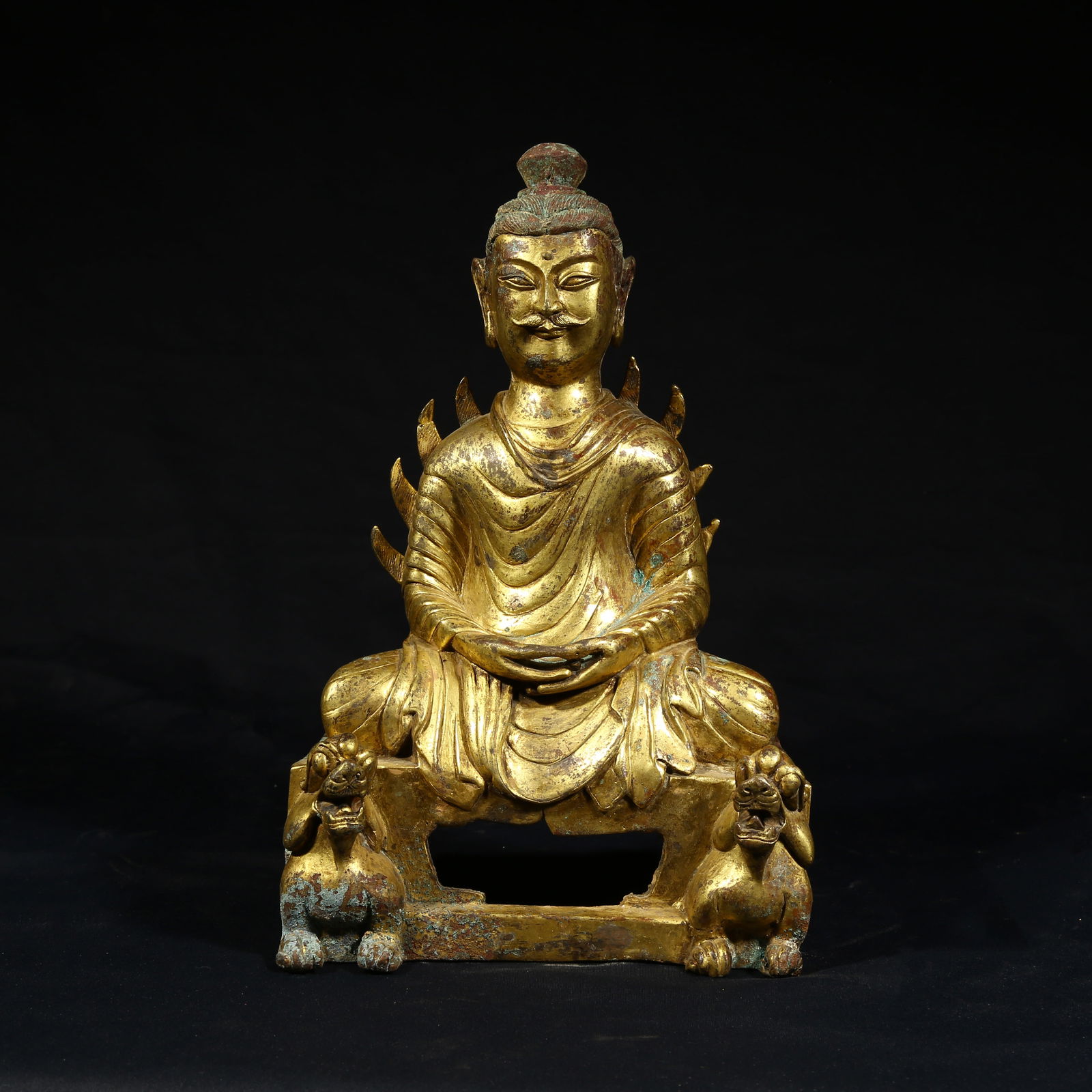 A GILDED BRONZE SHAKYAMUNI BUDDHA SCULPTURE (1 of 8)