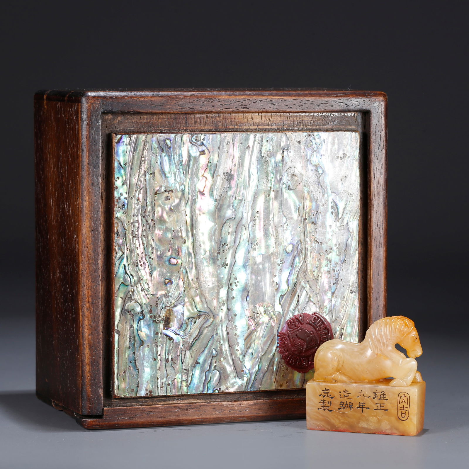 A SHOUSHAN TIANHUANG STONE SEAL WITH GALLOPING HORSE-SHAPED KNOP: Shoushan Tianhuang stone seal with galloping horse-shaped knop