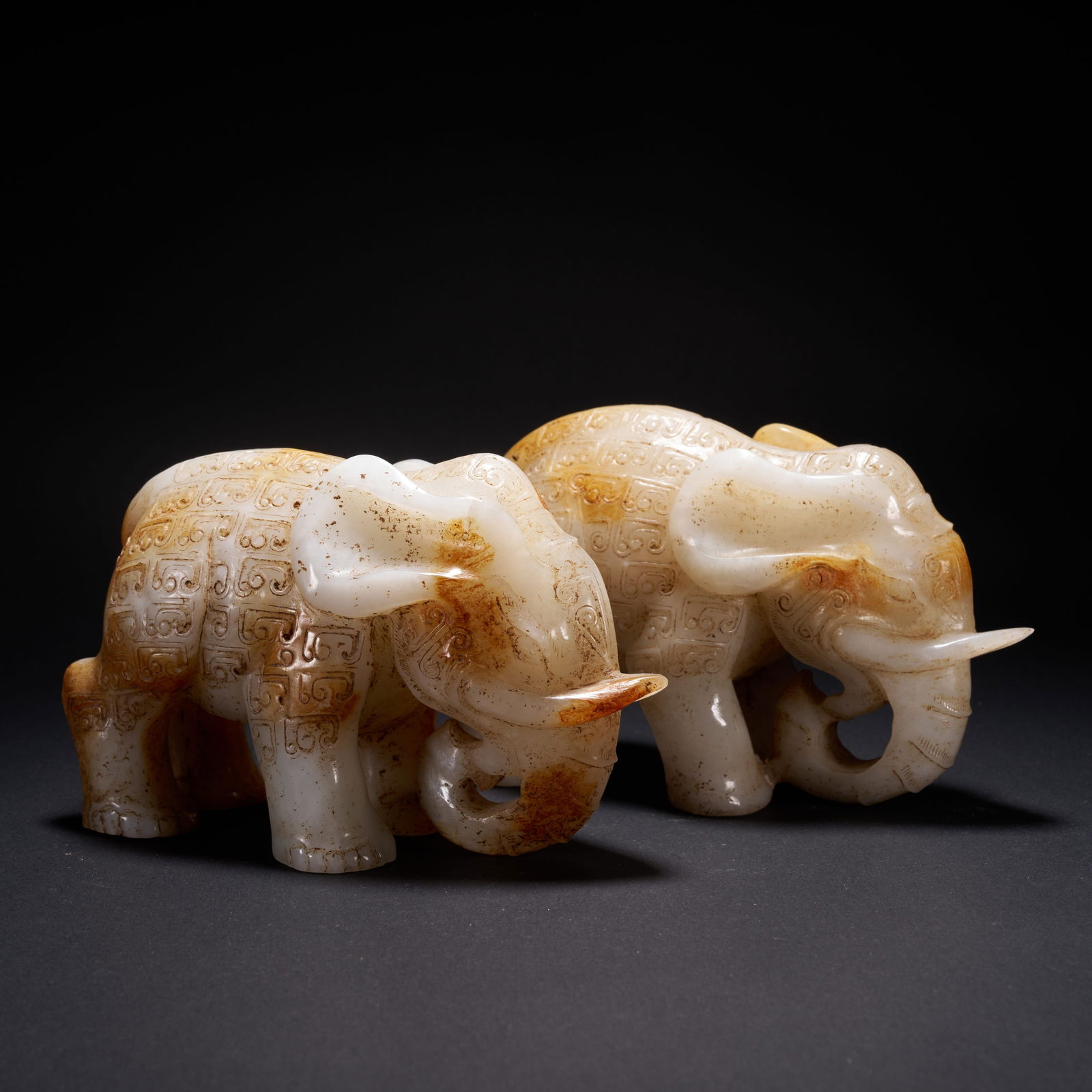 A SET OF HETIAN JADE ELEPHANTS, HAN DYNASTY (1 of 7)
