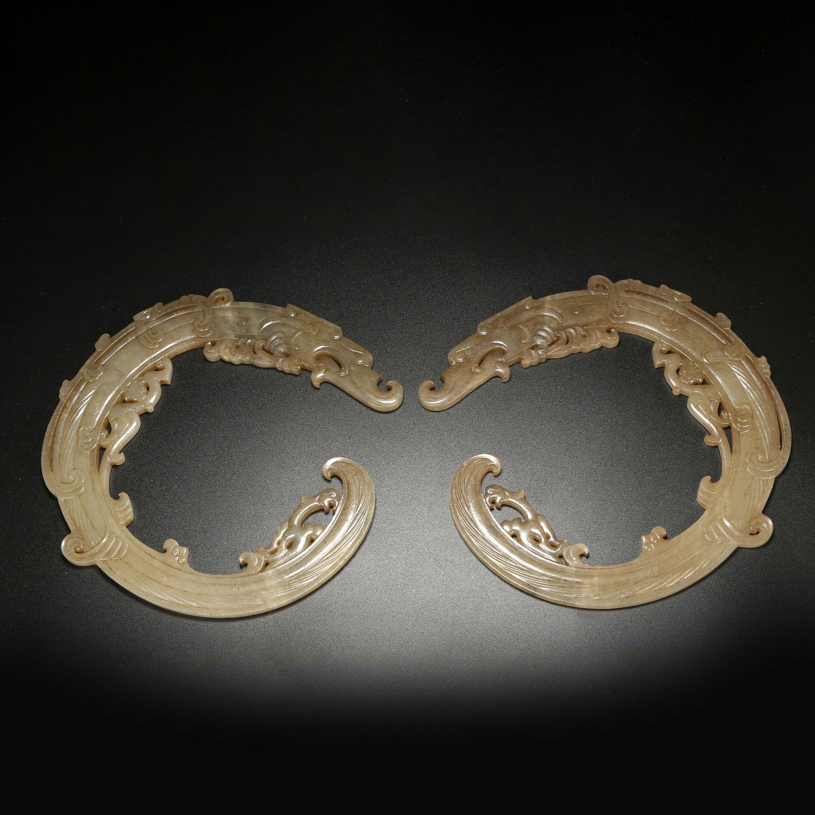 A SET OF ANCIENT JADE DRAGON-SHAPED PENDANTS (1 of 9)