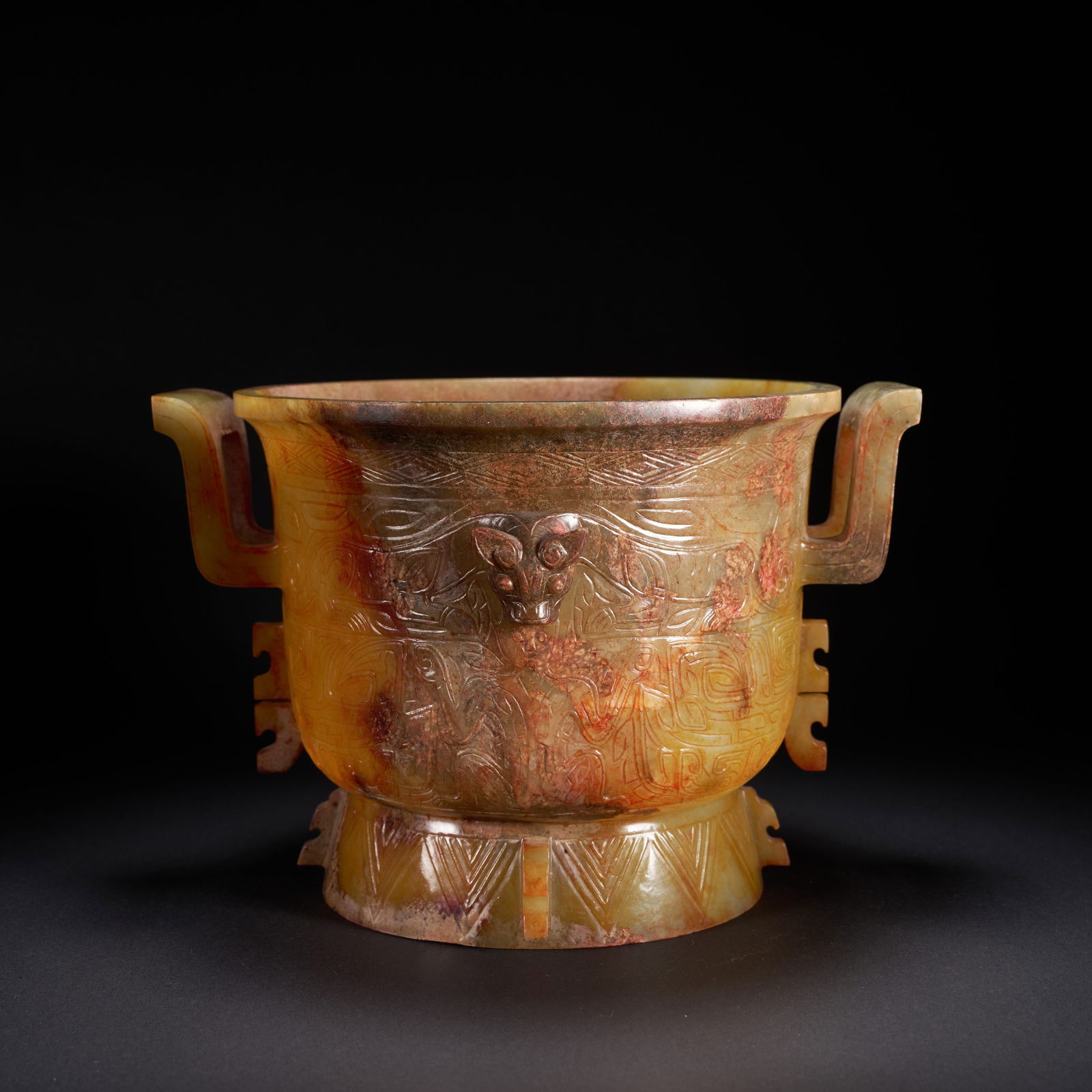 A HETIAN JADE CENSER WITH TWIN HANDLES AND BEAST-MASK MOTIFS, HAN DYNASTY (1 of 8)