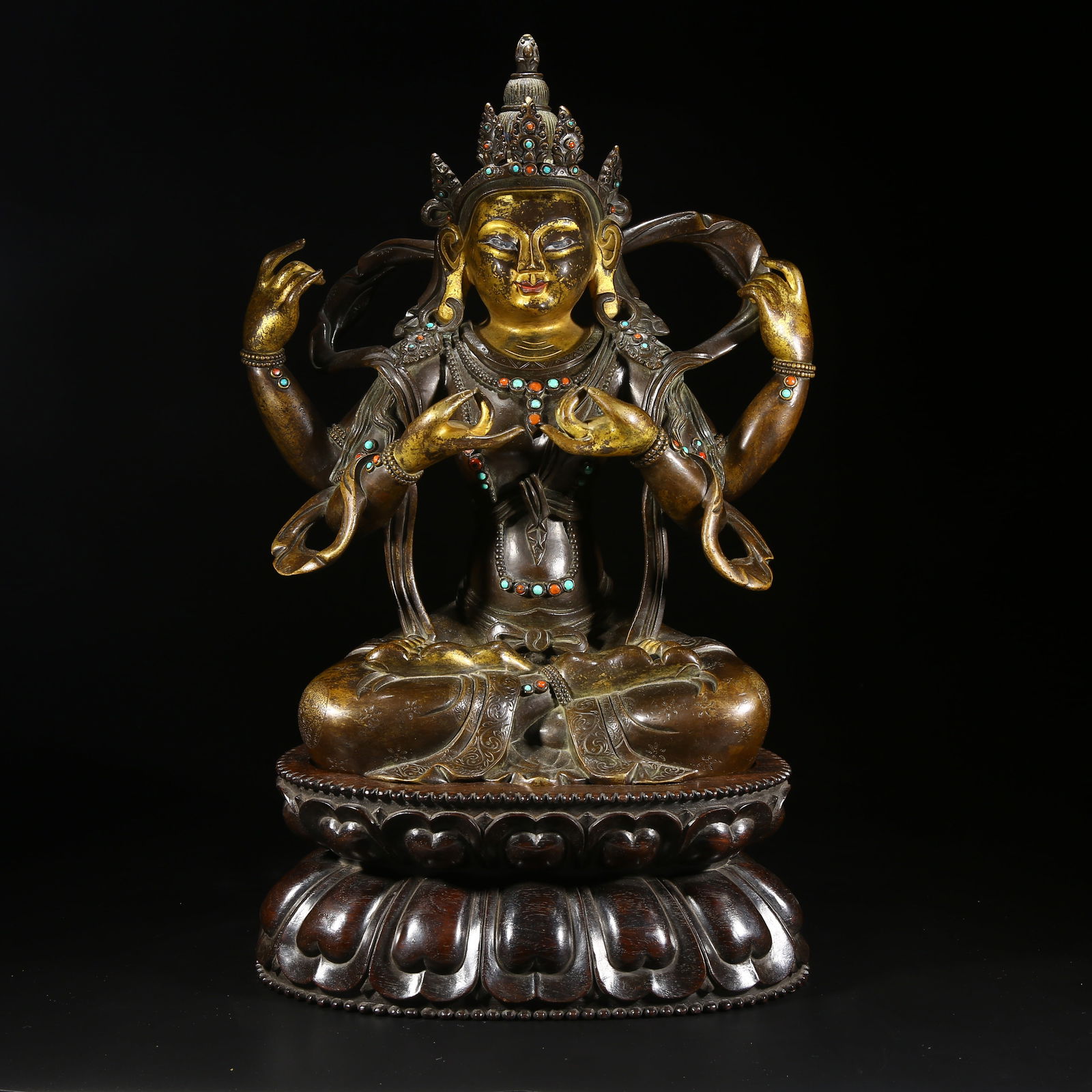 A GILDED BRONZE STATUE OF FOUR-ARMED VAJRAVARAHI (1 of 8)