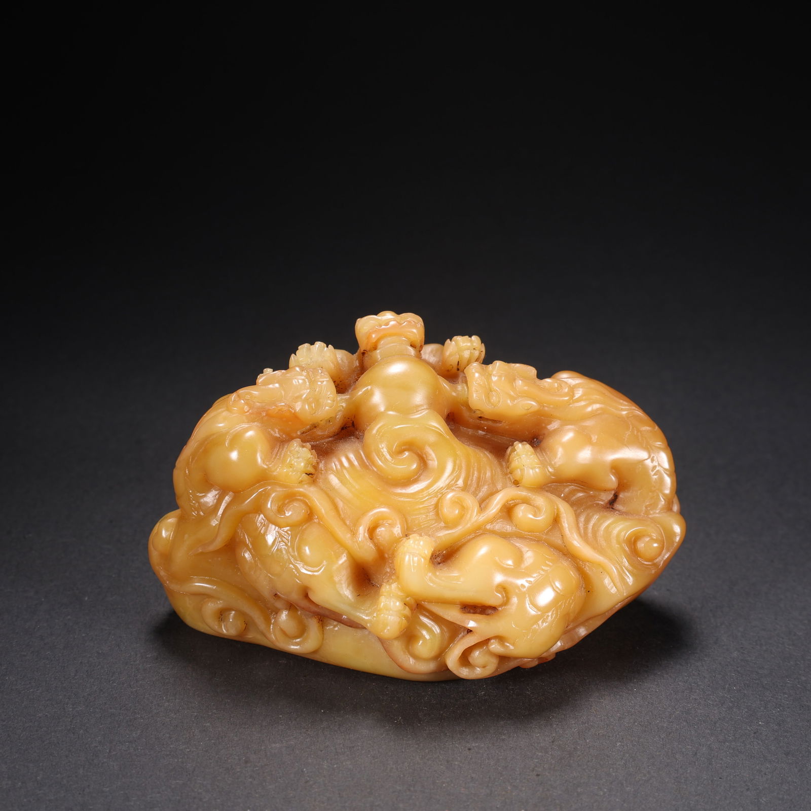 A TIANHUANG STONE SEAL WITH THREE DRAGONS PLAYING WITH PEARL MOTIF: Tianhuang Stone Seal with Three Dragons Playing with Pearl Motif
