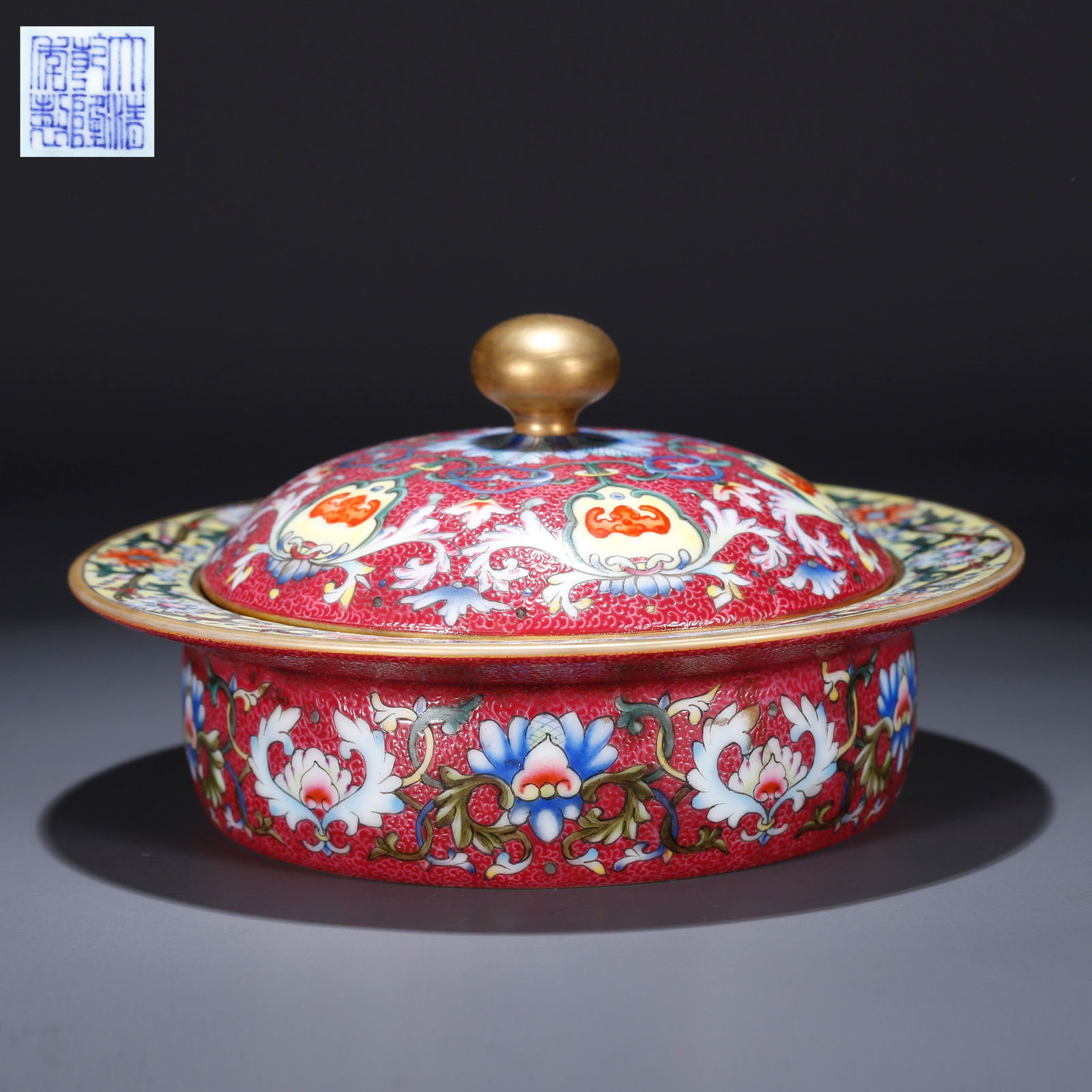 A ENAMELLED LIDDED JAR WITH INTERTWINED FLORAL DESIGN: Enamelled lidded jar with intertwined floral design
