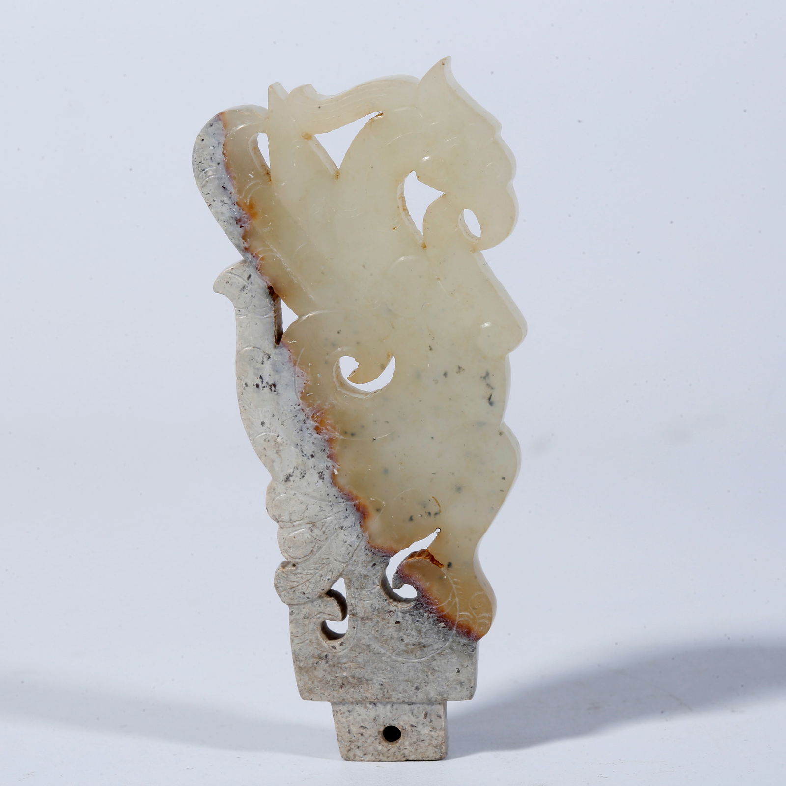 A HETIAN JADE PENDANT CARVED IN THE SHAPE OF A PHOENIX (1 of 10)