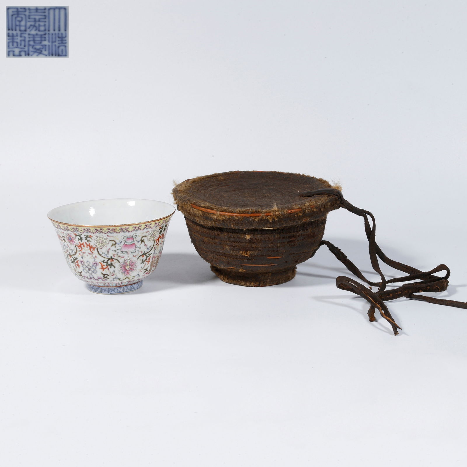 A FAMILLE ROSE BOWL WITH SCROLLING FLORAL DESIGN: Famille rose bowl with scrolling floral design