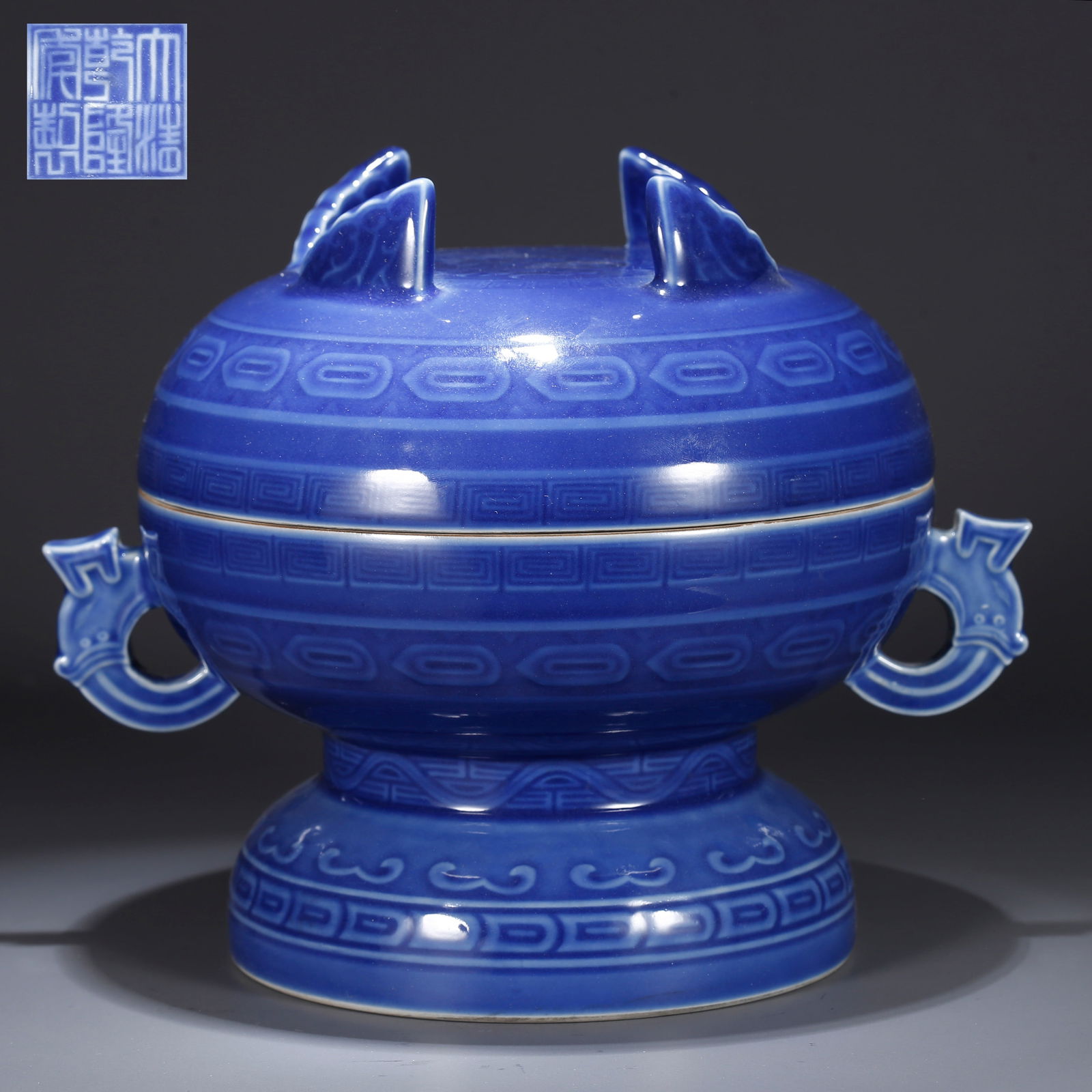 A BLUE GLAZE LIDDED JAR WITH CLOUD AND DRAGON DESIGN (1 of 10)