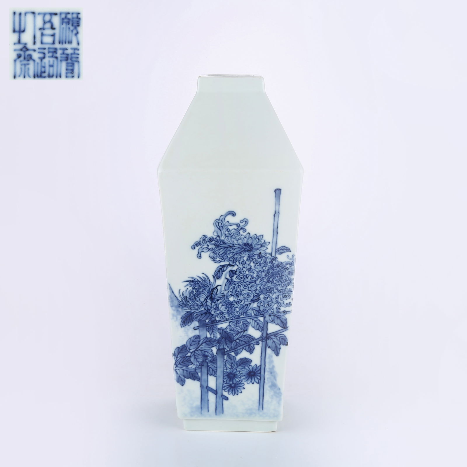 A BLUE AND WHITE SQUARE VASE WITH CHRYSANTHEMUM MOTIF IN THE STYLE OF WANG BU: Blue and White Square Vase with Chrysanthemum Motif in the Style of Wang Bu