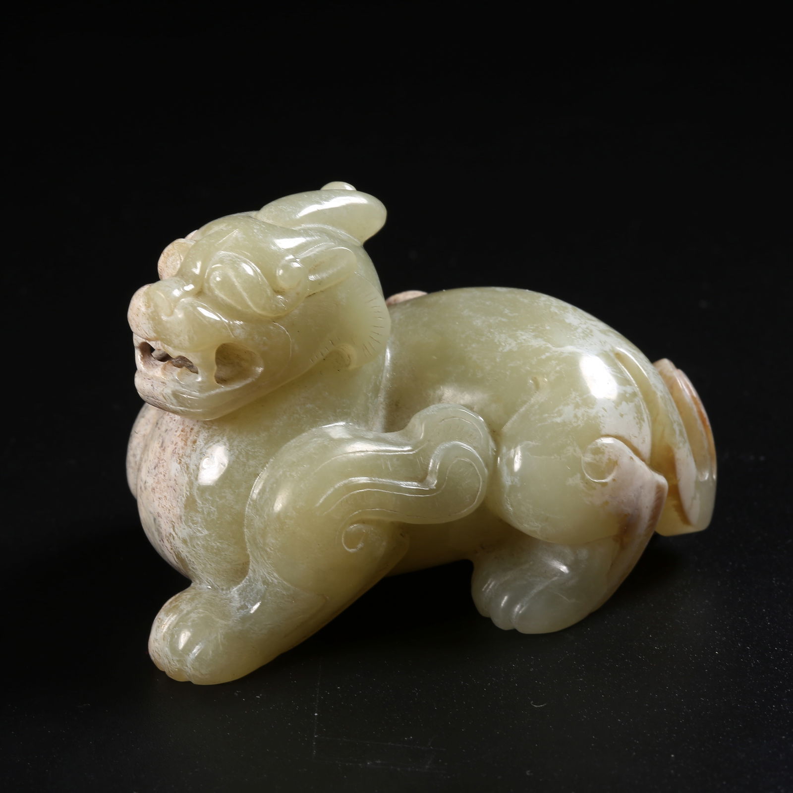 A ARCHAIC JADE AUSPICIOUS BEAST ORNAMENT: Archaic jade auspicious beast ornament