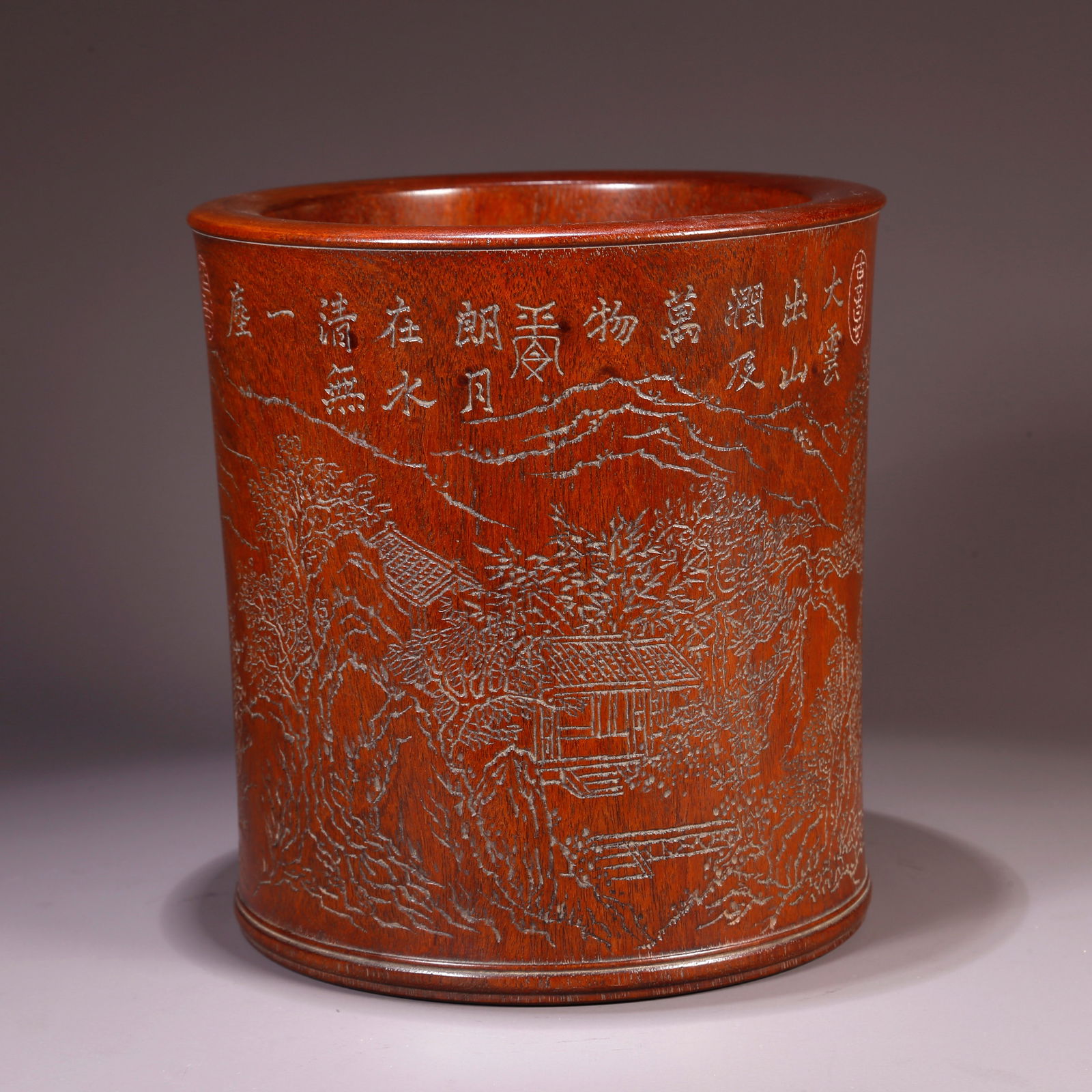 A HUANGHUALI BRUSH POT CARVED WITH LANDSCAPE DESIGN: Huanghuali Brush Pot Carved with Landscape Design