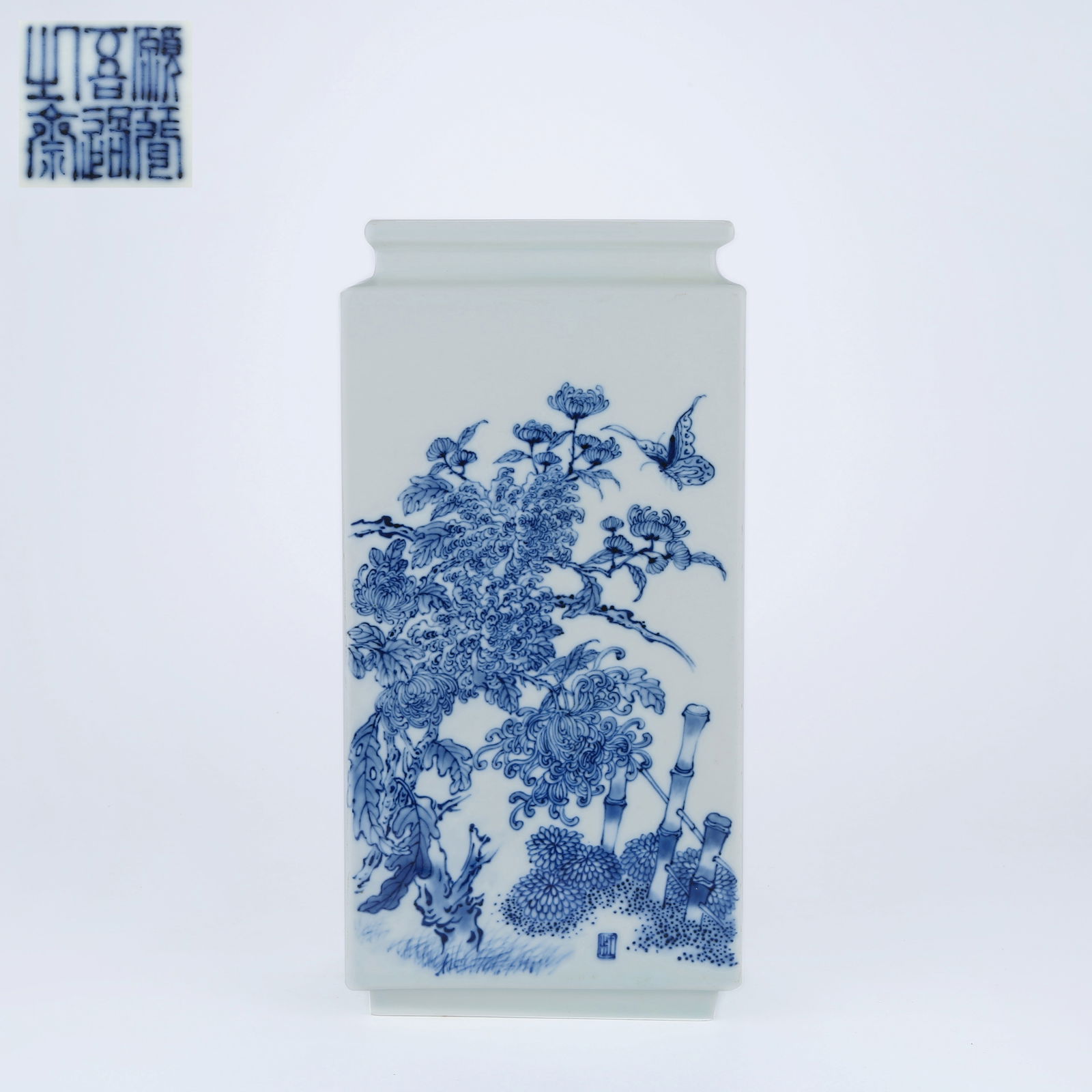 A BLUE AND WHITE SQUARE VASE WITH FLORAL AND BUTTERFLY MOTIF IN THE STYLE OF WANG BU (1 of 10)