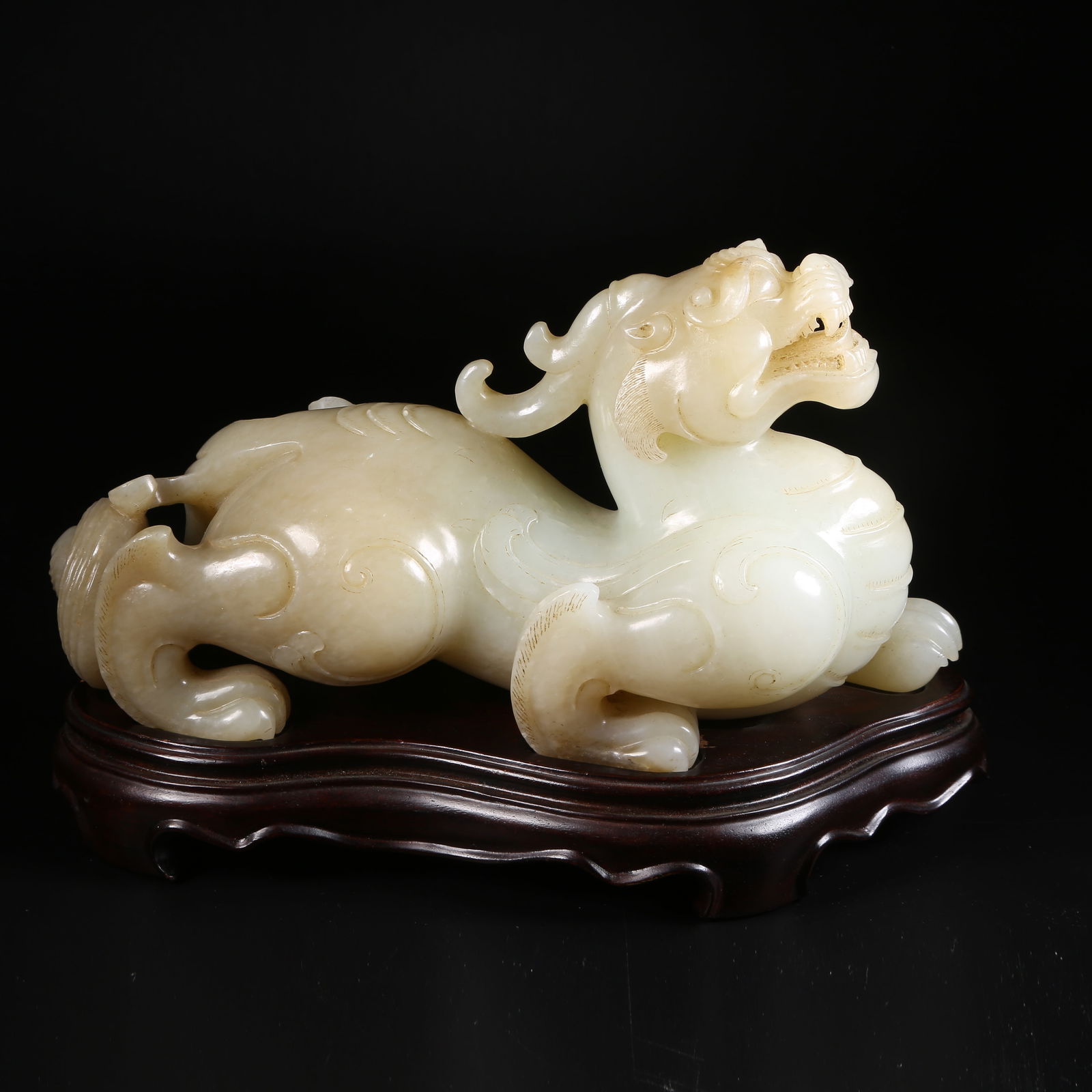 A ARCHAIC JADE AUSPICIOUS BEAST ORNAMENT (1 of 8)