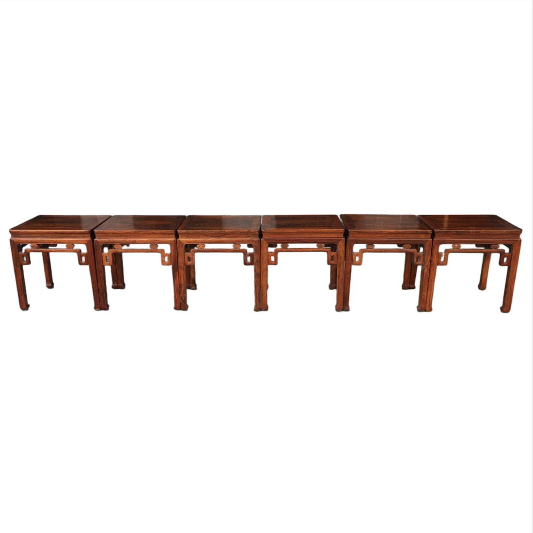 A SET OF SIX HUANGHUALI SQUARE STOOLS CARVED WITH LINGZHI PATTERN (1 of 11)