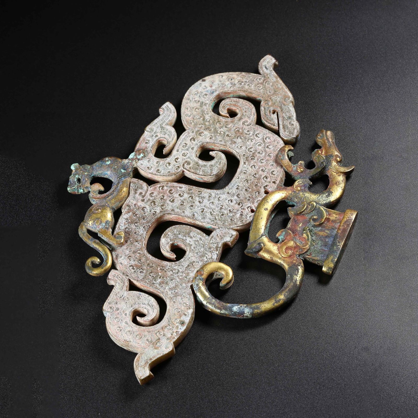 A GILDED BRONZE DRAGON PENDANT INLAID WITH ANCIENT JADE: Gilded Bronze Dragon Pendant Inlaid with Ancient Jade