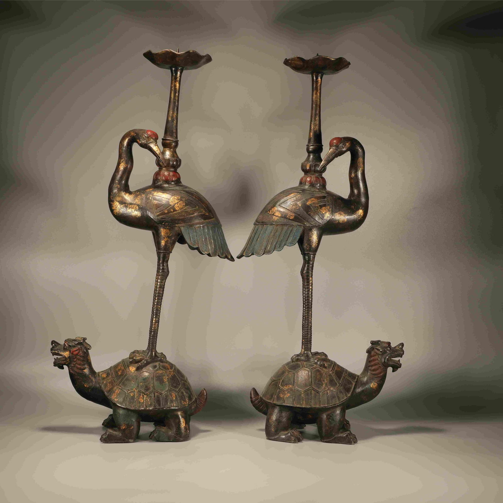 A PAIR OF BRONZE GOLD-SPECKLED CRANE CANDLESTICKS (1 of 7)