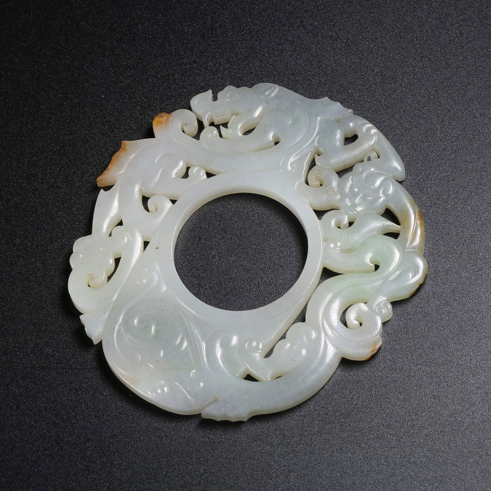 A HETIAN JADE DRAGON PENDANT: Hetian jade dragon pendant