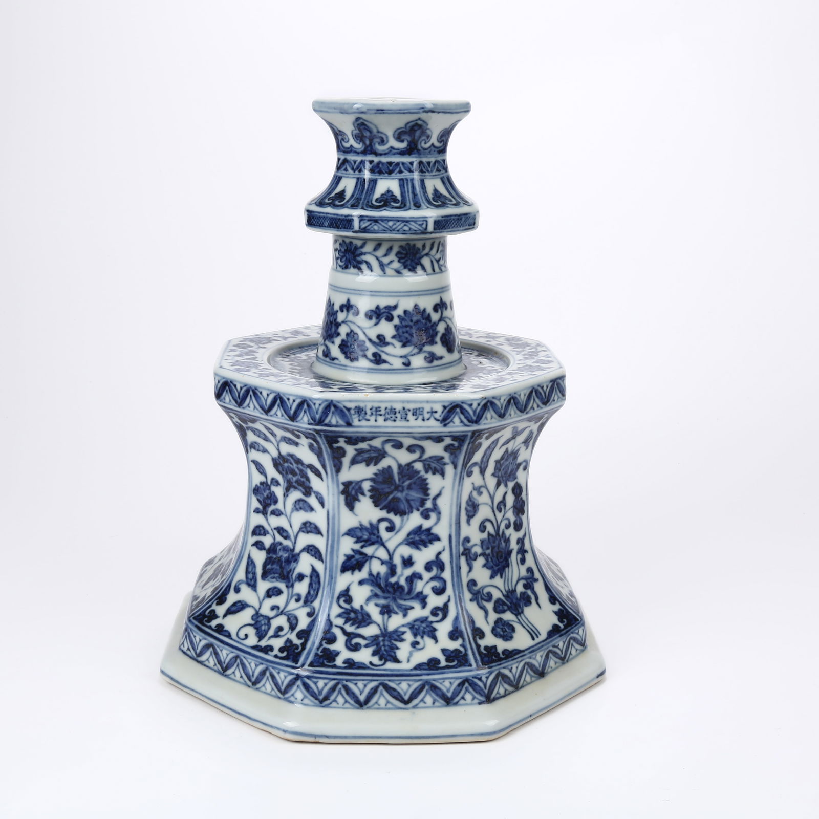 A BLUE AND WHITE OCTAGONAL CANDLESTICK WITH BRANCH FLOWER DESIGN (1 of 11)