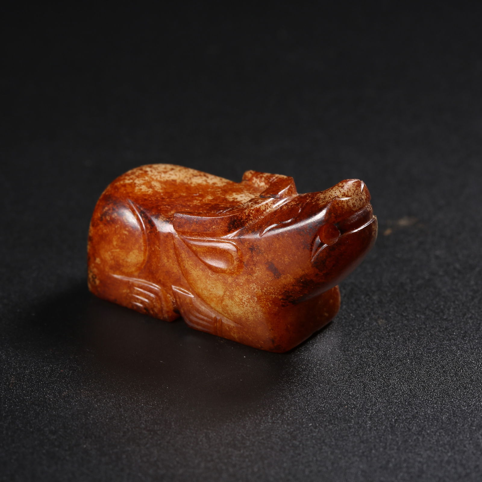 A ANCIENT JADE OX PENDANT (1 of 8)