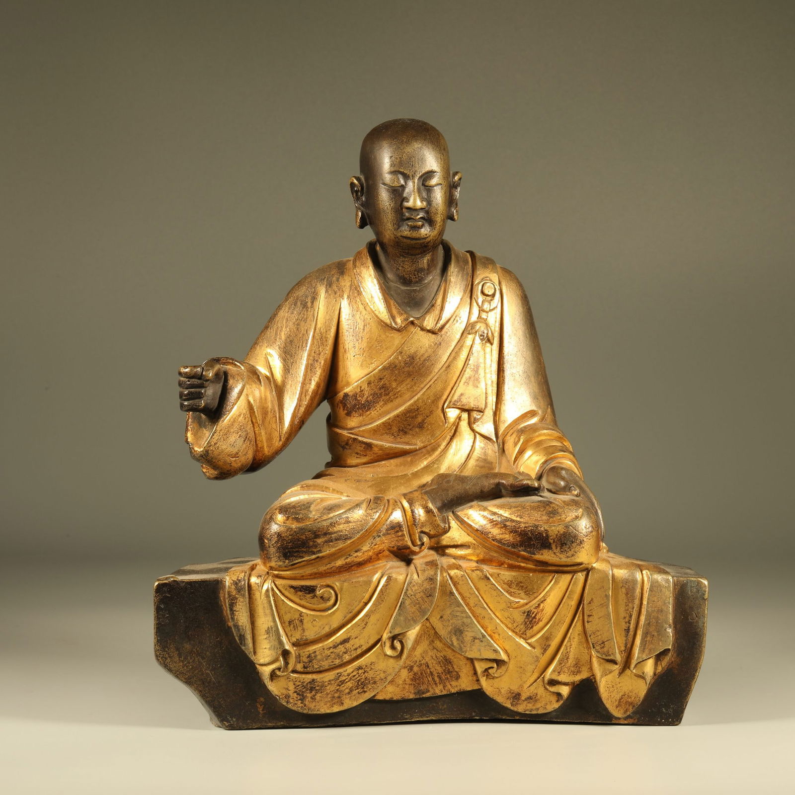 A GILT-BRONZE ARHAT STATUE (1 of 6)