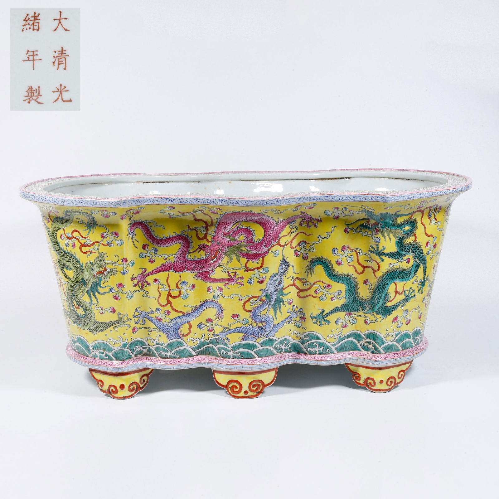 A LARGE YELLOW-GLAZED FLOWERPOT WITH DRAGON DESIGN (1 of 11)