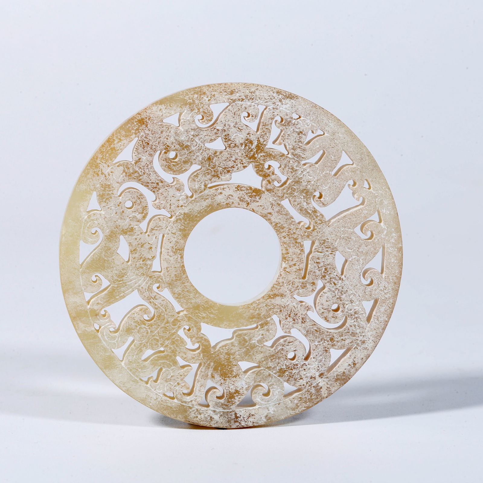 A HETIAN JADE PENDANT CARVED WITH MAY FOURTH-STYLE AUSPICIOUS BEAST PATTERN (1 of 9)