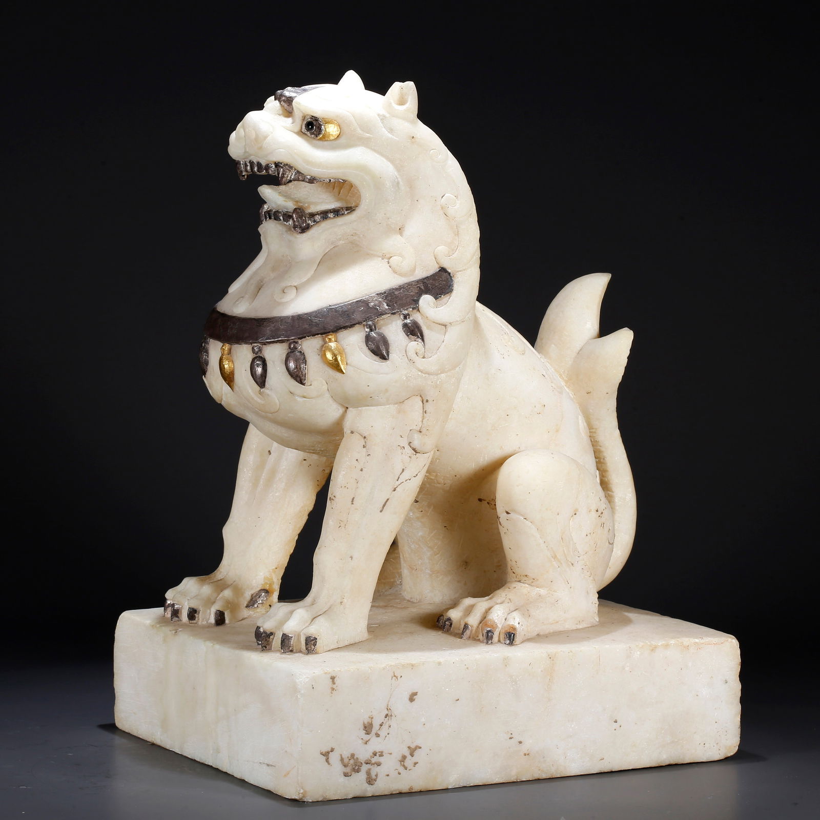 A CARVED HAN WHITE JADE AUSPICIOUS BEAST ORNAMENT: Carved Han White Jade Auspicious Beast Ornament