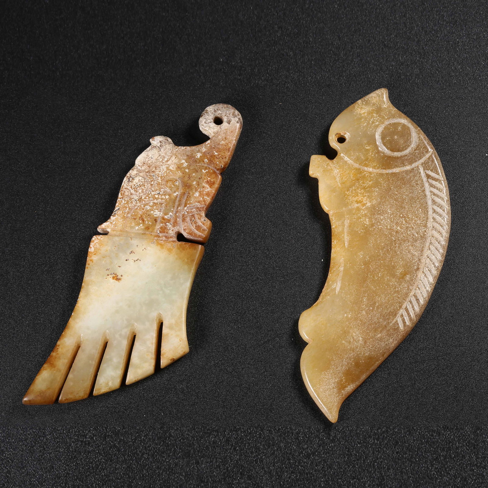 A SET OF ANCIENT JADE PENDANTS (1 of 7)