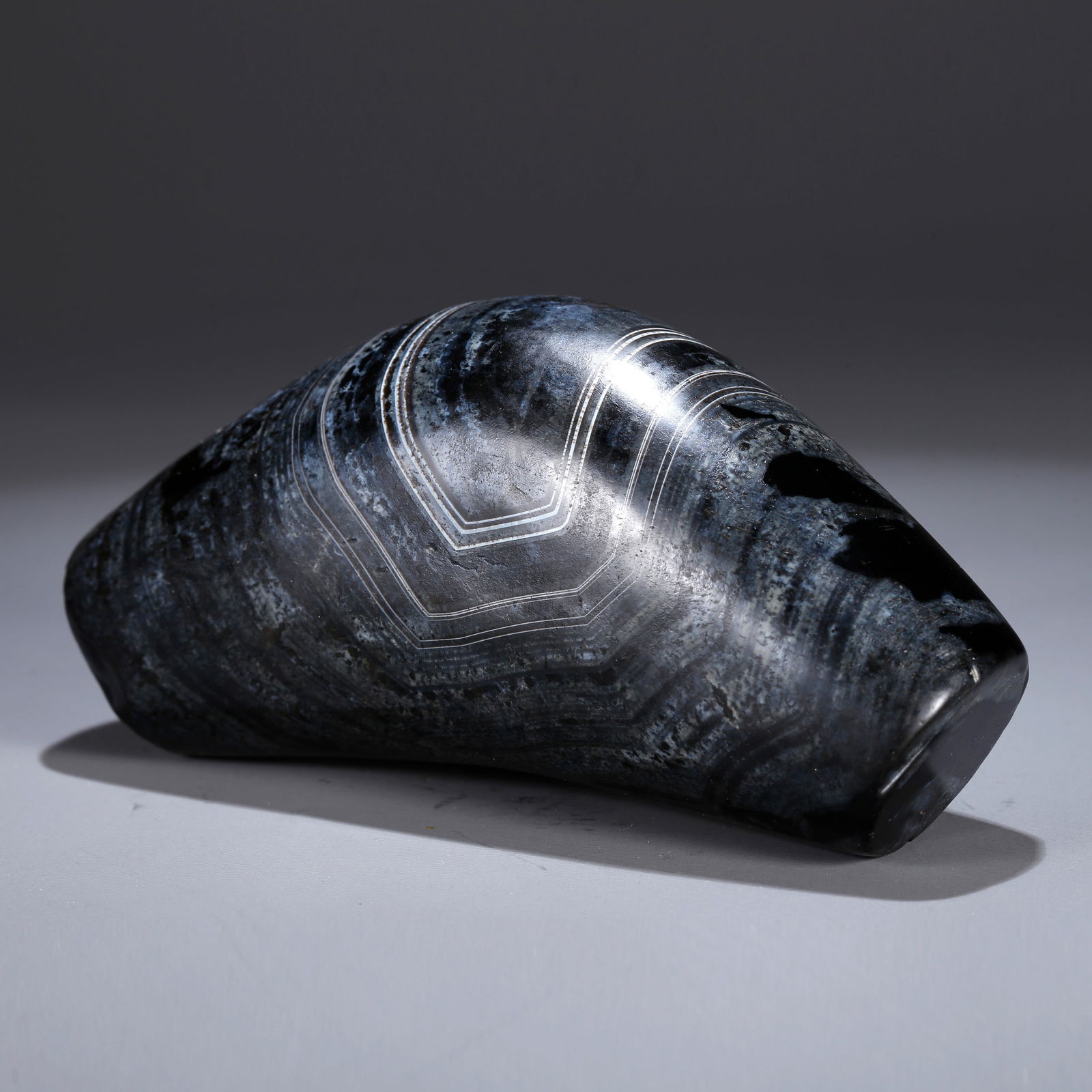 A HORN-SHAPED DZI BEAD (1 of 10)