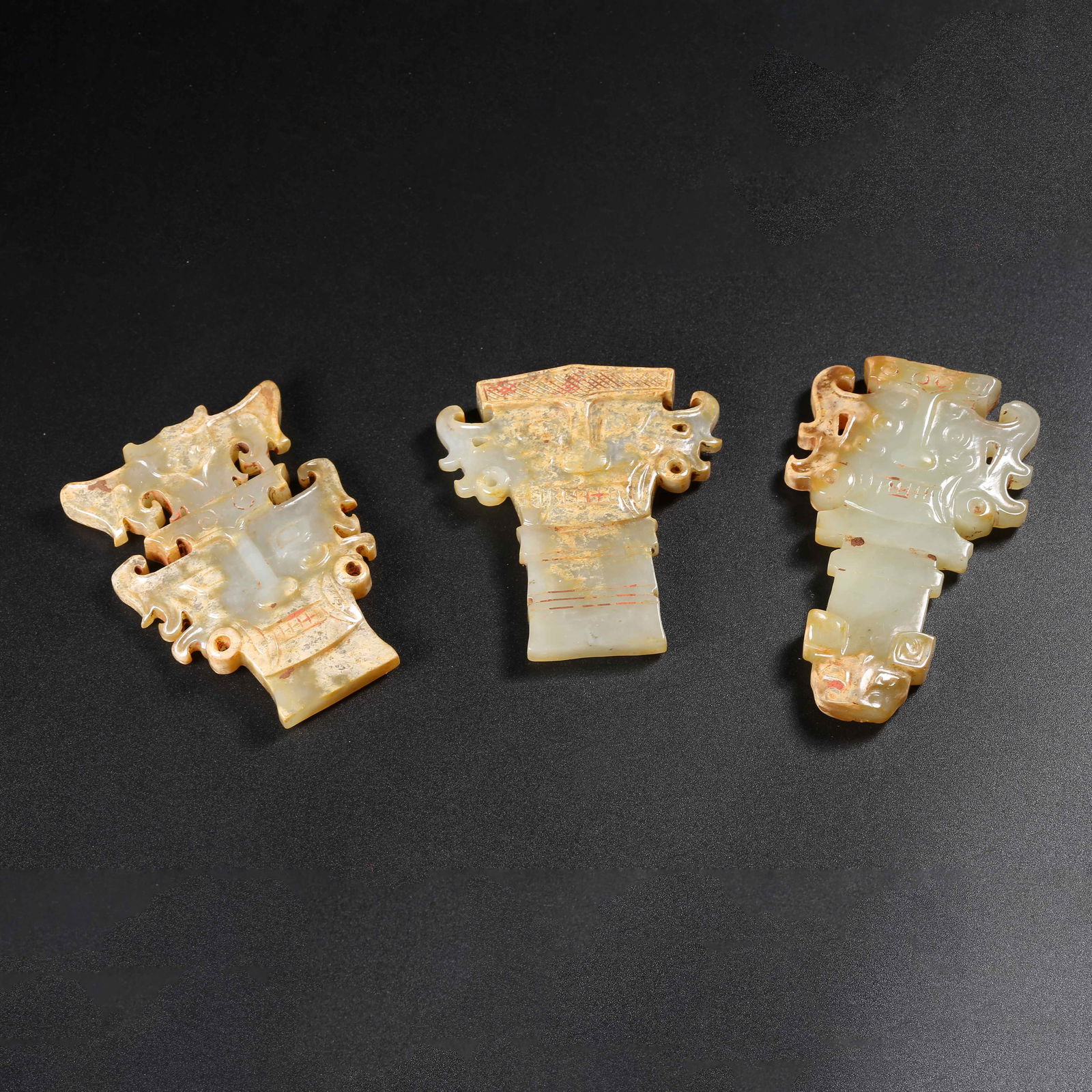 A SET OF ANCIENT JADE MASKS OF DEITIES (1 of 9)