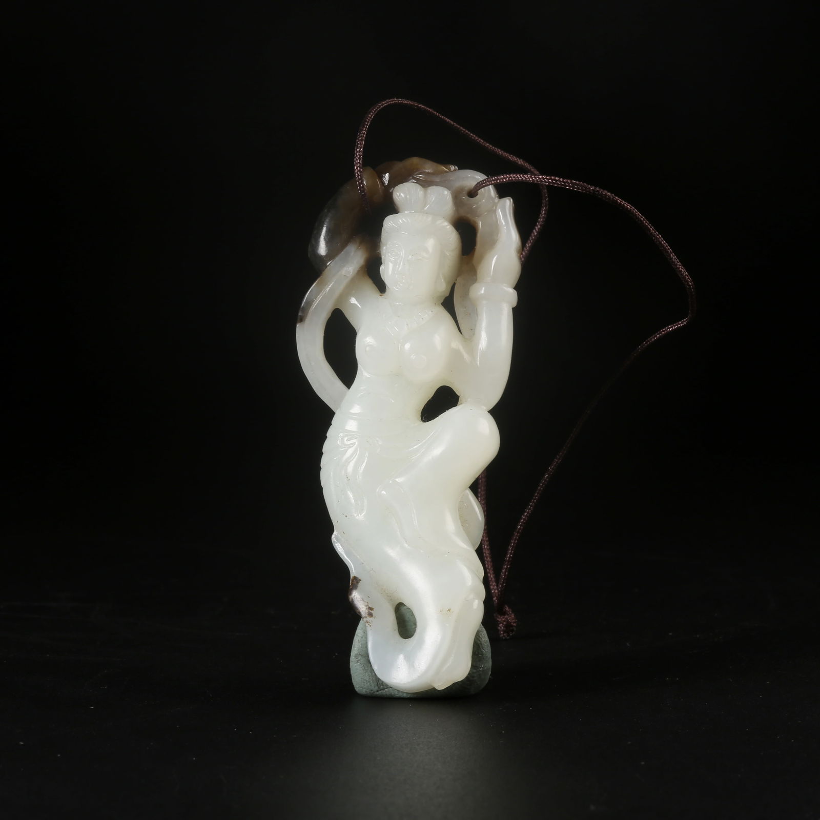 A HETIAN JADE FLYING APSARA PENDANT (1 of 8)
