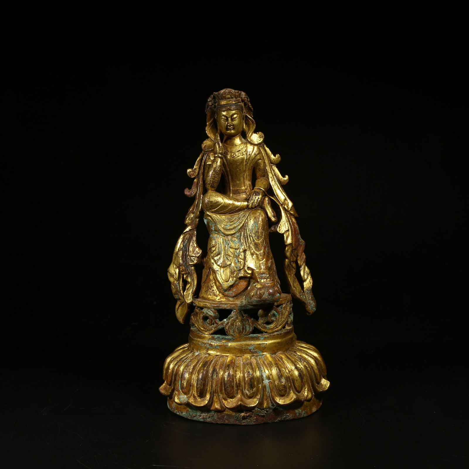 A GILT-BRONZE FIGURE OF SEATED GUANYIN (1 of 8)