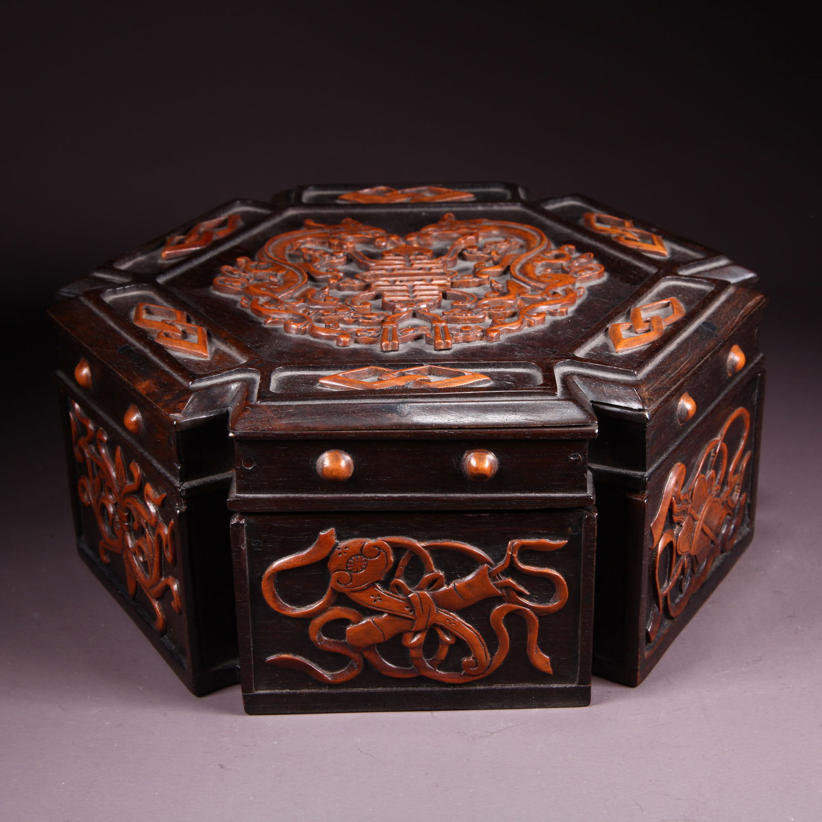 A ZITAN COVERED BOX INLAID WITH HUANGYANG WOOD, DOUBLE DRAGONS HOLDING LONGEVITY PATTERN, HEXAGONAL (1 of 9)